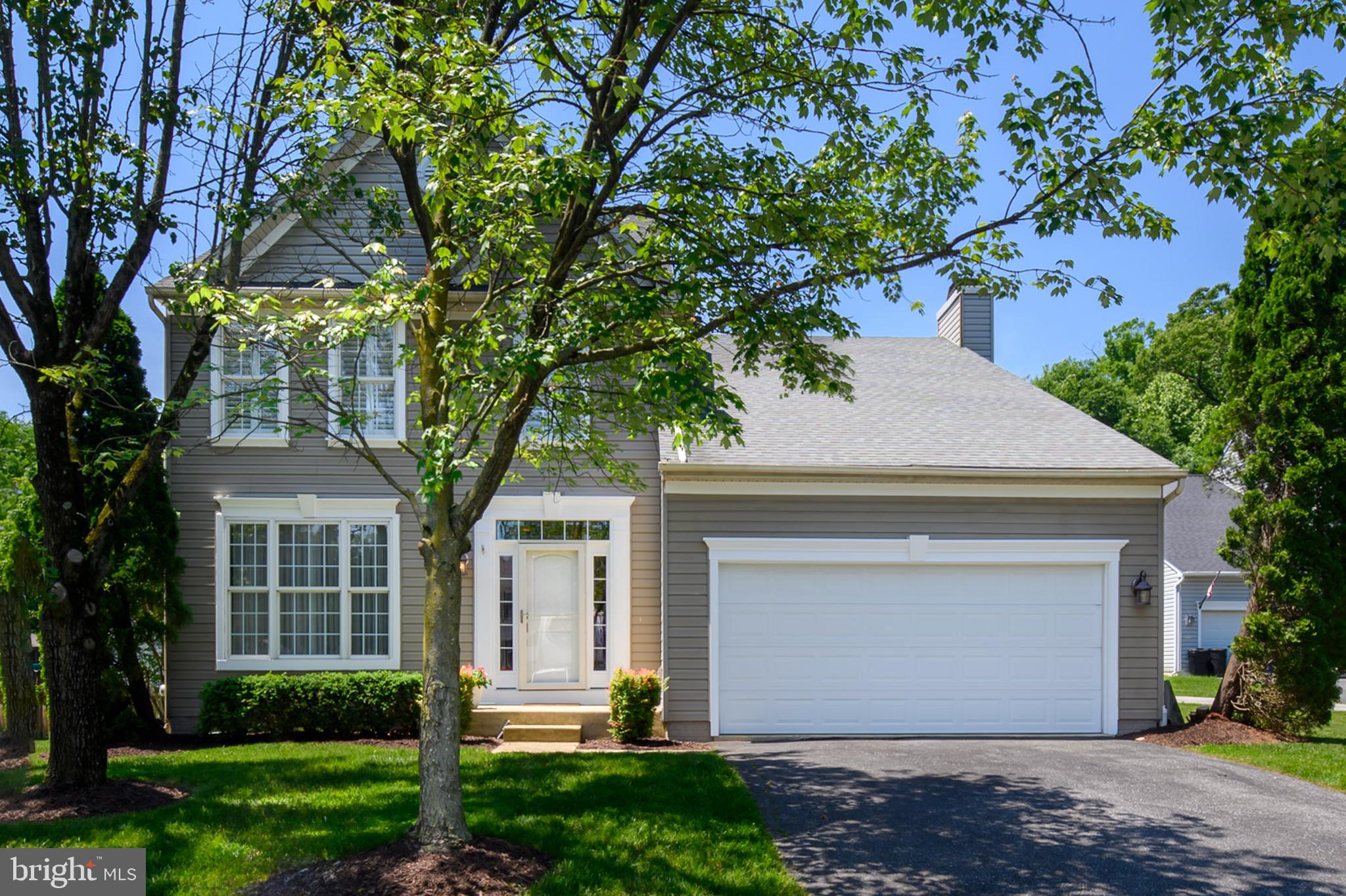 Stunning single family home in Howard County filled with all the right upgrades! The sunny two-story foyer features gleaming hardwood floors and sets the tone for a bright and open floor. The fully renovated kitchen boasts hardwood flooring, on-trend white cabinets, quartz countertops, upgraded appliances and a custom backsplash. The relaxing family room off the kitchen with a wood burning fireplace is great for casual living while the formal living and dining rooms are great for entertaining. The primary bedroom is a perfect escape with hardwood floors, custom trim work, plantation shutters, 2 walk-in closets and a fully renovated primary bathroom. The bathroom features custom tile work, upgraded lighting, a double sink/vanity with quartz counters, a free-standing tub and shower with frameless glass. Three additional bedrooms and a full bath complete the upper level. The finished lower level with a spacious rec room and wet bar is the perfect place to unwind and catch a game with friends. Entertaining is a breeze in the fenced back yard offering a deck with a retractible awning, a paver patio and a very functional, flat back yard! This home is convenient to shopping, recreation and commuter routes.