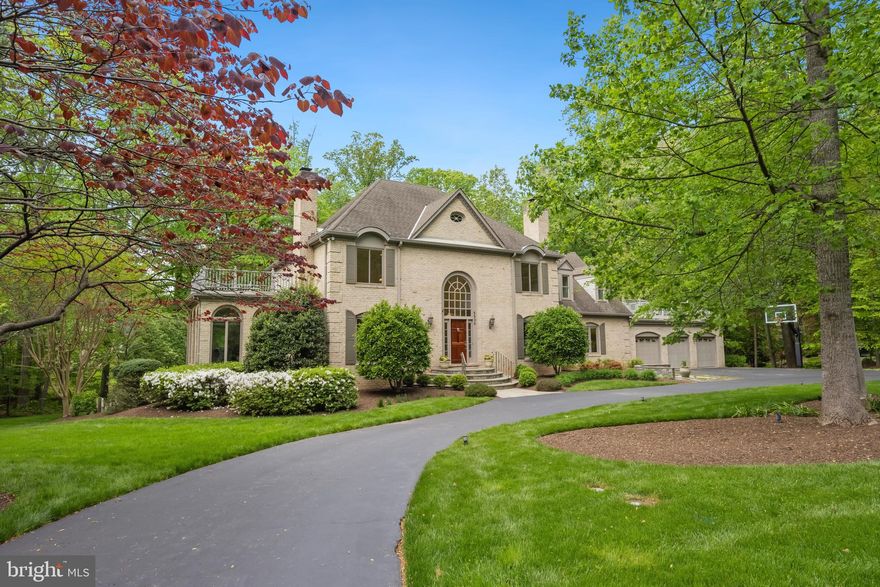 Elegant and stunning, move-in ready in Langley Oaks.  Renovations abound in this 6 bedroom, 3.5 bath, 3 car garage home.  Brick front with in-ground pool sited on a serene 1-acre wooded lot.  A home with its own private cul-de-sac where the kids can play with no worry of traffic.  The gracious floor plan is designed to serve today’s busy family and is complimented by an abundance of areas for outdoor activities. Great flowing main level includes formal living and dining rooms, sunroom, library, kitchen, family room and bonus flex room.  Two story grand foyer includes L-shaped staircase, porcelain tile and wainscoting.  Living room has wood burning fireplace and flows to the dining room.  A spectacular sunroom with walls of windows providing an abundance of natural light is off the dining room.  The well-designed, gourmet center island kitchen includes a breakfast bar and separate eating area.   The kitchen features new white quartz countertops, Brookhaven cabinets, Viking range and downdraft, GE wall oven/microwave combination, Aline drink refrigerator, undermount GE water filtration system, and InstaHot and cold water dispenser.   The kitchen together with family room (gas fireplace) and adjacent bonus room provide great spaces for indoor gatherings and activities.  The library has beautiful wood built-ins surrounding a wood burning fireplace. The main level laundry/mud room has custom built-in cubbies and ironing station.  The mudroom can be accessed directly from the three car garage.  There are four spacious bedrooms upstairs for the family with a recreation room, two more bedrooms and a full bath for guests on the lower level.   The owner’s suite has bath with separate tub/shower, vaulted ceiling and balcony.  The kitchen and family room lead to a deck with a large screened-in area as well as an open area overlooking the pool and yard.  Professionally landscaped with ambient landscape lighting and irrigation system.  Experience the perfect blend of luxury, privacy and convenience in this exceptional home.  Nearby trail leads to the Potomac River.   Walking distance to Langley High School and Clemyjontri Park.  Moments away from Tysons Corner with upscale shopping, fine dining and premier entertainment. Easy access to Georgetown Pike, I495, I66, Dulles Toll Road and the Silver Line Metro.  No HOA.  Property is not subject to Langley Home Owners Association.  A very versatile home. Hurry! (Photos and Virtual Tour now available)