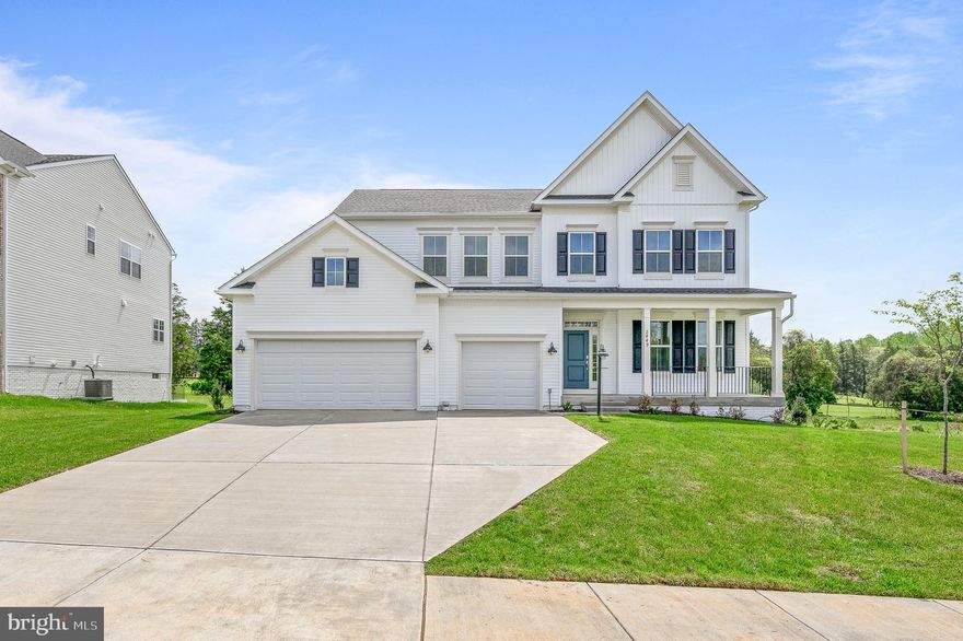 Beautiful Stonehaven cul-de-sac home built in 2025! This exquisite 5-bedroom, 3.5-bathroom, 3-car garage single-family home offers the perfect blend of modern luxury, thoughtful design, and light-filled open living.  From the moment you enter, the home impresses with bright, sun-filled interiors, soaring ceilings, and a contemporary open floor plan designed for both everyday living and effortless entertaining.
At the heart of the home is the gourmet chef’s kitchen, featuring stainless-steel appliances, a 5-burner gas cooktop, built-in microwave, wall oven, beautiful granite countertops, and a large center island with a deep sink and seating overhang. A spacious walk-in pantry and abundant cabinetry and counter space make this kitchen ideal for both cooking and entertaining. The kitchen flows seamlessly into the expansive family room, creating the true heart of the home. The main level includes a bedroom with a walk-in closet, making it perfect for guests, a home office, or multi-generational living.

Upstairs, the luxurious primary suite offers an oversized bedroom and a spa-inspired bathroom featuring a double-sink vanity, soaking tub, separate stall shower, and a custom walk-in closet with built-in shelving and drawers. Bedroom #2 includes its own private en-suite bathroom, while Bedrooms #3 and #4 share a Jack-and-Jill bathroom with double vanity and tub/shower combination. A spacious loft on the upper level provides additional flexible living space ideal for a media room, lounge, or play area. The laundry room is conveniently located on the upper level and includes brand-new front-loading washer and dryer.

The unfinished walk-up lower level offers endless potential, featuring a rough-in for a full bathroom and wet bar, allowing future expansion for additional living or entertainment space.
Step outside to enjoy the new deck and fully fenced backyard, perfect for outdoor entertaining, relaxing evenings, or play.

Located in the highly desirable Stonehaven community, residents enjoy a 240-acre preservation buffer along the Rappahannock River and over 500 acres along Route 621, creating a scenic and peaceful setting. The community amenities include a clubhouse, swimming pool, tennis courts, walking trails, a tot lot, and more. Conveniently located just minutes from historic Old Town Warrenton, shopping, dining, and major commuter routes.  A rare opportunity to own a nearly new luxury home in one of Warrenton’s most desirable communities.