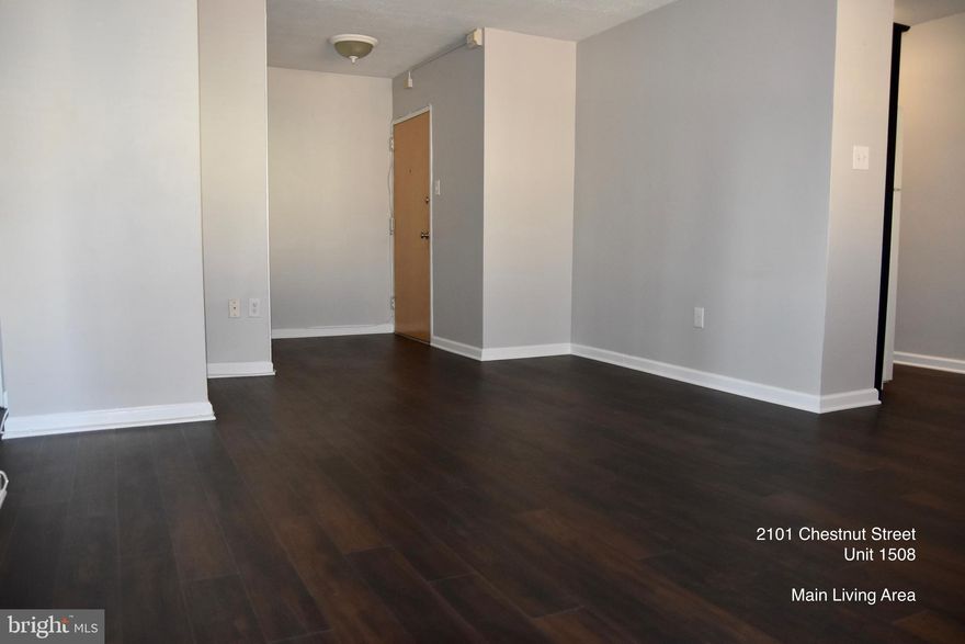 Amazing views + fantastic location + convenience and amenities = your next apartment! This corner 2 bedroom, 1 bathroom condo is nicely renovated and has ALL utilities included in the monthly rent! Enjoy sweeping city skyline views from the large living area featuring hardwood flooring. An updated galley-style kitchen provides good counter space, ample cabinetry, gas stove, and a full-sized dishwasher. Two bedrooms with good closet space, a nicely renovated full bath, and large hall closet storage, and brand new floors and fresh coat of paint complete this home. Brand new, Zoned HVAC system can be independently controlled from inside the Unit!  Residents at River West Condominium enjoy a 24-hour front desk, secured entry, fitness center, resident's lounge, ALL utilities included (gas, electric, hot water), and basic cable + HBO. In-building laundry facilities and plenty of parking options close-by. Located in the Rittenhouse Square neighborhood, this home is blocks away from some of the best of Philly's dining and retail scene, world-class museums and cultural attractions, and convenient to highways and public and mass transit, Penn, Drexel, and more