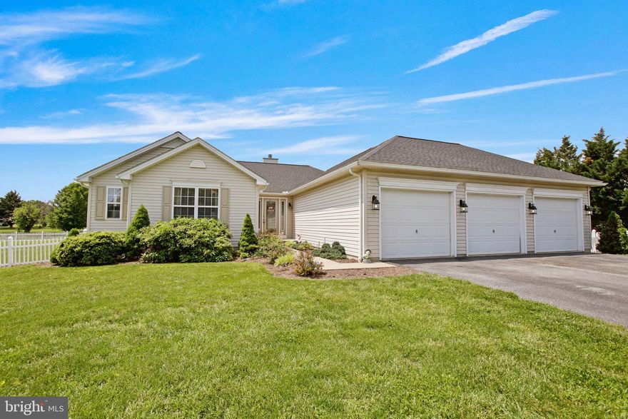 Spacious 5-bedroom, 3-bath ranch-style home set on nearly an acre in the established Federal Hill community in Martinsburg, offering over 2,800 square feet of finished living space across the thoughtfully designed main level with finished lower level that blends comfort, function, and style.

Inside, the home welcomes you with a large, light-filled living room—perfect for relaxing or entertaining—flowing seamlessly into a dedicated dining area. The eat-in kitchen features warm wood cabinetry, ample countertop space, a center island with bar seating, and a full suite of appliances, offering both everyday convenience and flexibility for hosting. Adjacent to the kitchen, a cozy family room provides an additional gathering space, complete with a wood burning fireplace for year-round comfort.

Four bedrooms are located on the main level, including a generously sized primary suite with a walk-in closet and a private en-suite bath with double vanities, a soaking tub, and separate shower. The three secondary bedrooms offer roomy closets and easy access to a well-appointed full hall bath. A large laundry room with storage cabinetry and a utility sink adds functionality, while wide hallways and neutral finishes throughout contribute to the home’s open, welcoming feel.

The lower level is finished with a spacious recreation room, 5th bedroom and full bathroom and a walk out entrance.

The roof was replaced in 2024, and a new heat pump system was installed in 2023—offering energy-efficient comfort and peace of mind. Set on a 0.78-acre lot, the backyard offers endless potential for outdoor enjoyment, from gardening to entertaining. The attached 3-car garage and long driveway provide ample parking and storage options.

Ideally situated just minutes from shopping, dining, and services in Martinsburg, the home is also close to local attractions such as War Memorial Park, the Martinsburg Roundhouse, and nearby vineyards and trails. Commuters will appreciate the quick access to I-81 and Route 9, as well as proximity to the MARC train station for travel into Northern Virginia or Washington, D.C. Dulles International Airport is approximately an hour away, making regional and international travel convenient.

A comfortable and well-cared-for home in a peaceful neighborhood, offering the space and layout to suit a variety of lifestyles.