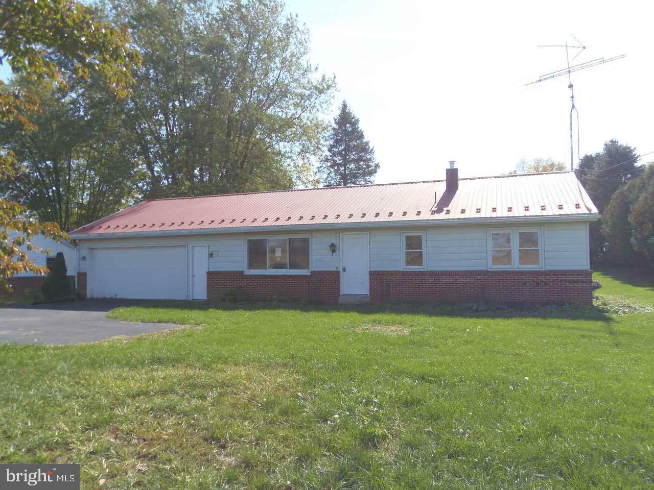 Enjoy the country setting in this Ranch style home located on .72 acre lot. Home offers 3 bedrooms and 1 full bathroom. Living Room, Dining area off of kitchen. Oversized 2 car garage with ample storage over garage area. Large rear yard with workshop building and shed.