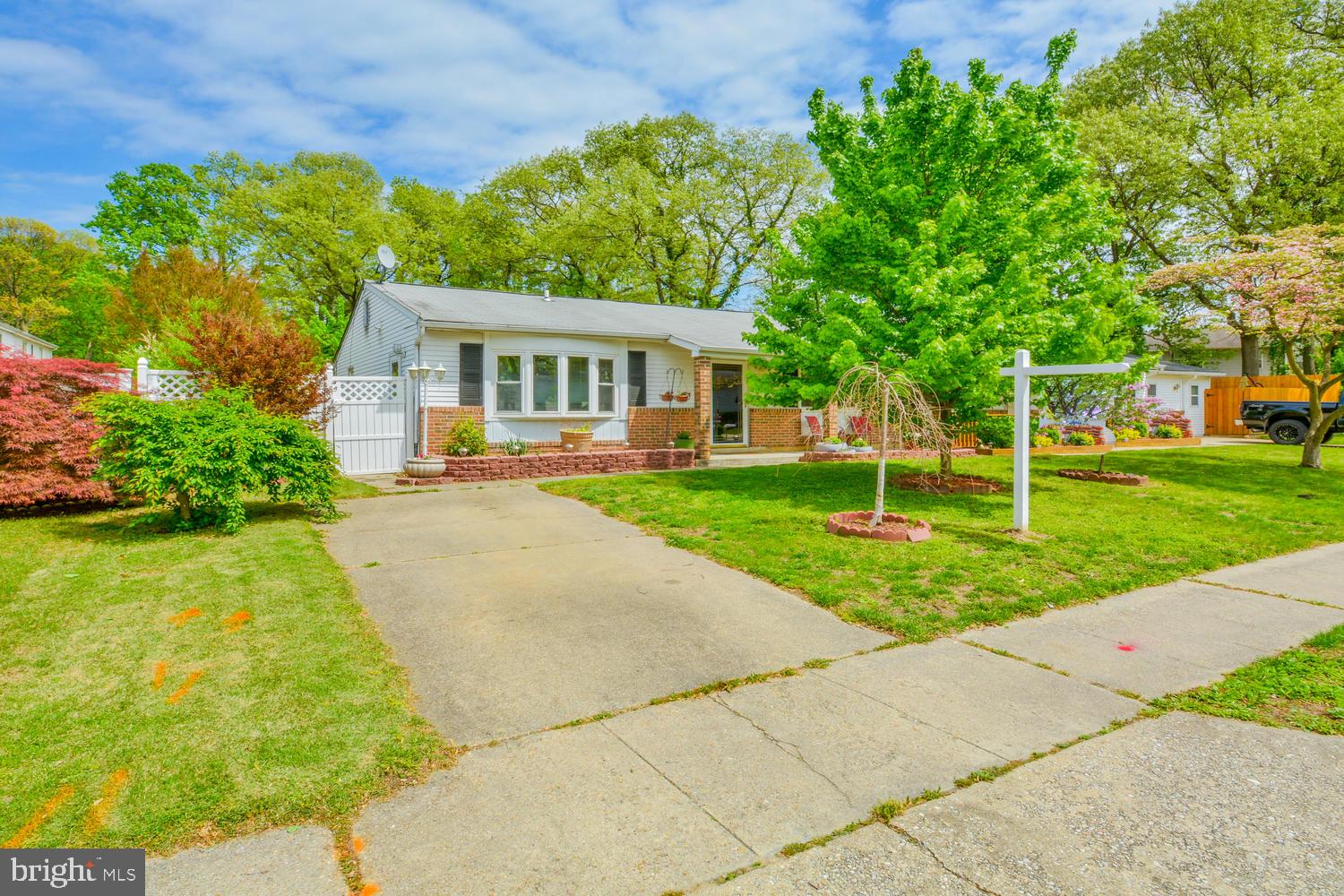 This adorable Ranch Style duplex is priced to sell and Coming Soon! This home features 3 bedrooms and one full bath, an eat-in kitchen with updated cabinets and ceramic tile floors. The owners have installed lovely Hardwood floors in the living room, hallway and all three bedrooms. The third bedroom offers French doors to a spacious screened in porch addition which is perfect for those spring/summer/fall barbecues with friends and family. The screen porch overlooks the beautifully landscaped rear yard. Welcome home!!