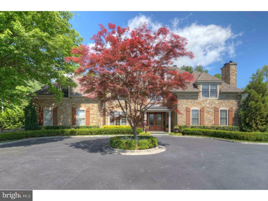 As soon as you open the Mahogany front door of this exceptional Northside Bryn Mawr Home you are immediately struck by the attention to detail.. No expense was spared in this whole house renovation by a prominent main line builder, new from the foundation up this Five Bedroom Main Line Home surrounded by formal gardens and mature specimen landscaping.  The inviting open floor plan with Brazilian Teak Floors is perfect for entertaining with formal dining room, a Viking eat in kitchen open to large family room, and architectural digest style sun room addition, large living room/music room and exquisite study with custom cherry wet bar with onyx countertop, comparable to the most distinguished club rooms in the area, all with custom built-ins and onyx or travertine surround open log gas fireplaces. The stairway leads to oversized master suite with entry, dressing area, two walk in closets, large full bath with heated marble floor, steam shower and gas fireplace.  This floor also includes; large second floor Laundry, a princess suite and two large bedrooms with beautifully appointed jack and jill bath, and cherry office.  Third Floor with full bath currently used as a gym but could also be lovely guest suite.  Impeccably finished lower level with seven seat theater, bonus bedroom suite with large sitting area, teak floors and lovely kitchen making for any in-law or au pair's dream hideaway. Exceptional oversized lot with formal gardens, and patios, uplighting, irrigation system and immaculate 3 car garage round out this once in a lifetime home in award winning Lower Merion Schools.  LOW TAXES....