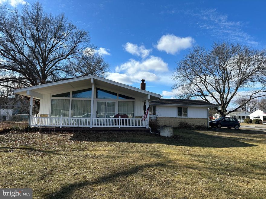 Charming 3 bedroom 1 1/2 bath ranch home on a corner lot  in the Golden Rod Development.  Home has a 2 car garage attached  through a breezeway.  Covered front porch,  perfect for relaxing.  Stainless steel refrigerator in the beautiful kitchen with built-in oven & cooktop.  All accented with decorative lighting highlighting the solid cherry cabinets.  Solid cherry interior trim and doors.  The home throughout has solid hardwood floors & ceramic tile flooring.    Spacious layout with timeless charm.   This home offers a functional & stylish space in a desirable neighborhood.  With a fenced in yard & shed to store your lawn mower.  Home has a full basement which could be transformed into your family room or gym.  Possibilities are endless.  Set up your showing today!