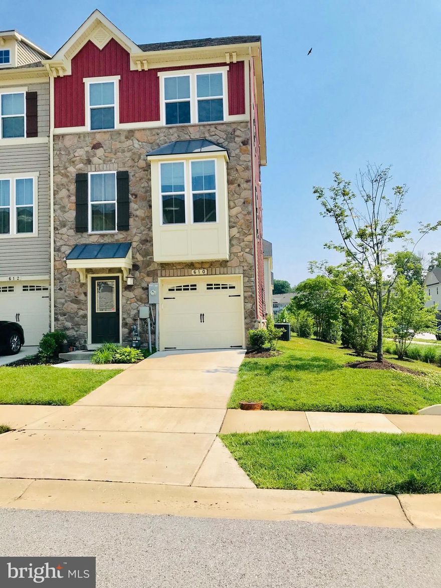 The sellers will be giving 3% closing help to the buyers for any offers accepted in July. GORGEOUS End of Group in Creekside Village offers open flowing floor plan perfect for parties & entertaining! Why wait for new when you can buy this better than new home loaded with upgrades? Highlights of this home include 9' ceilings on all three levels, gourmet kitchen with cherry cabinetry, granite countertops & stainless appliances plus center island, breakfast bar! Master suite has full bath with oversized shower with 2 shower heads and upgraded tiles! Handsome hardwood floors in kitchen and breakfast area. Lots of natural light with additional windows on side! Finished lower level recreation room with walkout to back yard! Amenities include unlimited street parking spaces, pool, dog park, 24/7 gym, basketball court and clubhouse! Come enjoy easy living!