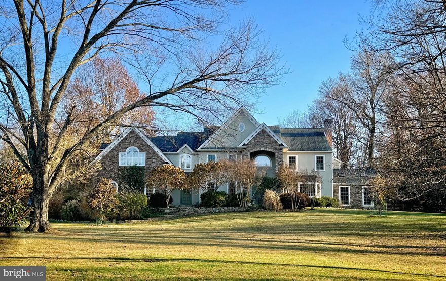 Stunning home, over 6,000 sq ft in White Gate in Wrightstown Township.  Situated on over 4 acres, this custom home features 5 bedrooms, 5.5 baths, gourmet kitchen, stunning family room with coffered ceiling and fireplace, dining room with brick fireplace with raised hearth, and built ins.  Exquisite woodworking with extensive use of crown molding, wainscoting, and enough built-ins to satisfy the most discriminating bibliophile.  Kitchen features large island with drawer microwave, bar sink with filtered water faucet.  Two dishwashers flank the hammered copper sink and the commercial range with double ovens allow for large scale entertaining.  Large SubZero occupies the wall opposite the sink as well as a large pantry closet for storage.  Four car oversized garage has access to the large laundry room with plentiful cabinetry, sink, granite counters, and large coat closet.  The living room features a fireplace, large front bay window, french doors connecting to the family room and stunning hardwood flooring.  The solarium, currently used as a secondary office has a cathedral ceiling with painted beams, skylights, built-ins, and plentiful windows.  The primary office has pocket french doors leading to the kitchen, multiple built-ins and a subtle grass cloth wallpaper.  The powder room has wainscoting as well as hardwood flooring, a new pedestal sink and has been freshly painted - as have most of the rooms in this expansive home.  
The upper floor features 4 bedrooms, plus the spacious Primary Bedroom - featuring a 20' walk-in closet with built in cabinetry, fireplace, sitting room with access to a small balcony, built-ins flanking the french doors to the balcony, a large bath with Palladian window over the oversized jetted Jacuzzi, walk-in shower and connecting steam shower, as well as an additional dressing room with cabinetry.  There are two additional hall baths, each with double vanities and a bedroom with en suite bath and walk in closet/dressing room.  Additionally, there is a laundry room on this upper level.  Finishing out the second floor is a library/study room with a full wall of built-ins, perfect for a quiet retreat for reading, studying or an extra office.  
A full basement with outside entrance, features tile flooring with a faux wood grain, an additional room with full bath, walk in pantry, and mechanicals, including 2 200 am panels.

OPEN HOUSE CANCELED - OFFER ACCEPTED