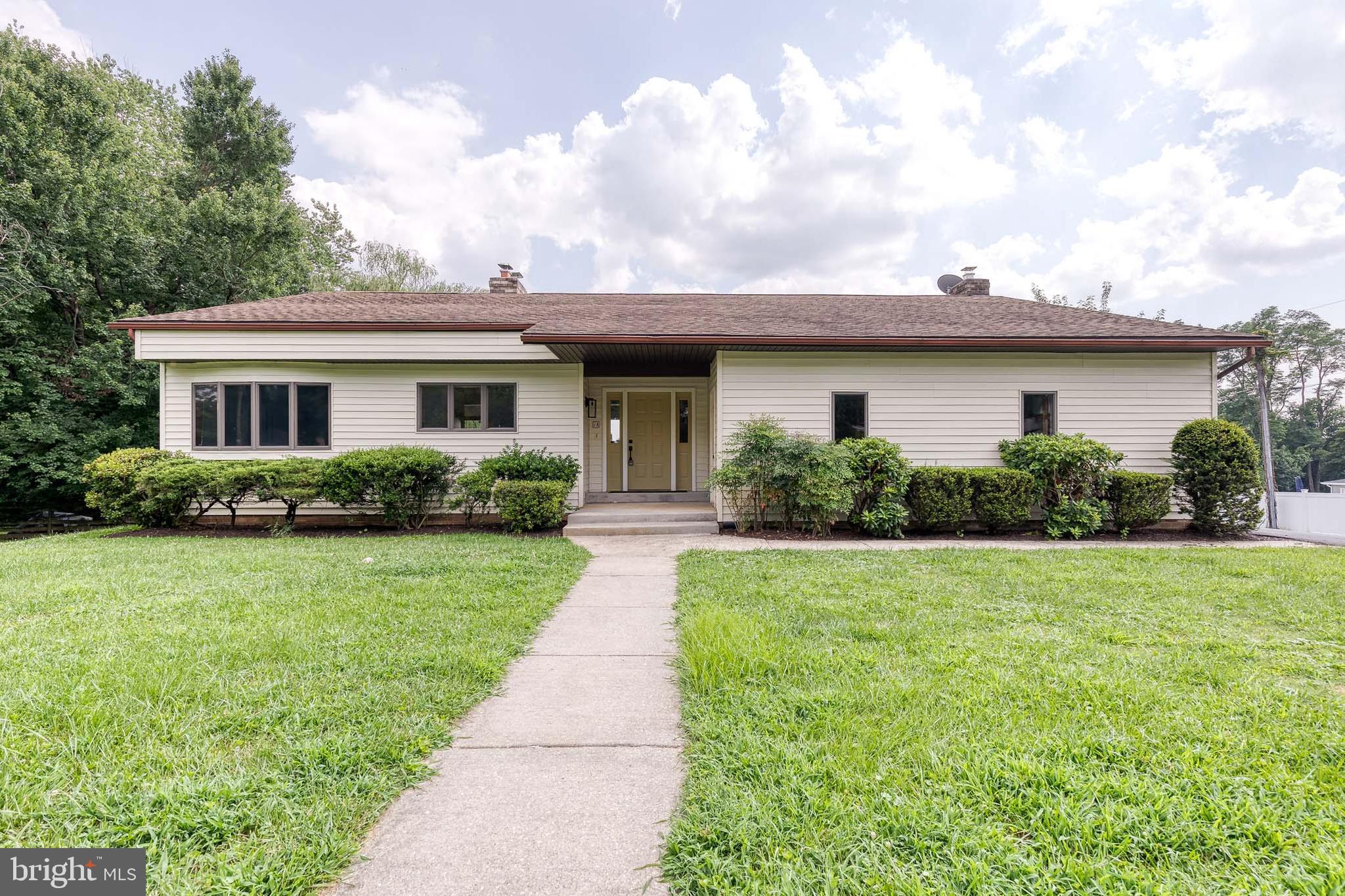 Price adjustment!! Architecturally Stunning Custom Rancher in the Heart of Owings Mills! Step into a rare opportunity to live in a one-of-a-kind, architecturally striking contemporary rancher, lovingly designed and custom built by the original owners—and meticulously maintained ever since. Nestled on a peaceful, tree-lined street in the heart of Owings Mills, this exceptional property offers style, space, and comfort in equal measure. A private side driveway welcomes you home, leading to a two-car garage with easy access for both everyday living and guests. As you enter, the home immediately makes a bold statement with its soaring ceilings, warm wood accents, and dramatic central brick fireplace—a stunning focal point that exudes both grandeur and coziness. At the heart of the main level is an expansive, open-concept living space that seamlessly blends the living room, dining area, and kitchen—perfect for entertaining or relaxing in comfort. Rustic wood beams span the ceilings, while freshly painted walls and brand-new plush carpeting create a light, fresh, and welcoming atmosphere. The kitchen is a chef’s dream, complete with miles of countertops, abundant cabinetry, a built-in breakfast nook, and charming custom trim. Whether you're hosting a dinner party or enjoying a quiet morning coffee, this space adapts effortlessly to your lifestyle. Down the hallway, you'll discover three generously sized bedrooms, each filled with natural light and thoughtfully laid out to maximize comfort and privacy. The remodeled main-level bathroom is beautifully appointed with modern fixtures and finishes, creating a spa-like retreat. Glass doors from both the living room and the bedrooms open onto a spacious, wraparound custom deck—designed to be your personal outdoor sanctuary. Step outside and prepare to be amazed. The expansive, fully fenced backyard is a true showstopper: a perfectly flat, two-tiered green space that feels like your own private park. Host summer barbecues on the upper deck, gather around the fire pit on cool evenings, or kick a ball around in the open grass—there’s even space for a full garden, play set, or soccer field. It’s a rare and exceptional outdoor experience that’s both functional and beautiful. Downstairs, the home continues to impress. A massive finished lower level offers an incredibly versatile space with room for a family room, home theater, rec room, playroom, home office—or all of the above. With its open layout, it’s limited only by your imagination. This level also includes a second full bathroom, and tons of storage, making it ideal for multigenerational living or hosting guests with privacy and ease.
From top to bottom, this home is a masterclass in thoughtful design, quality craftsmanship, and enduring charm. Located minutes from shopping, dining, parks, and major commuter routes, yet tucked into a quiet neighborhood setting—this is more than a house. It’s a home. Don’t miss your chance to rent this extraordinary property. Schedule your private tour today—and prepare to fall in love.