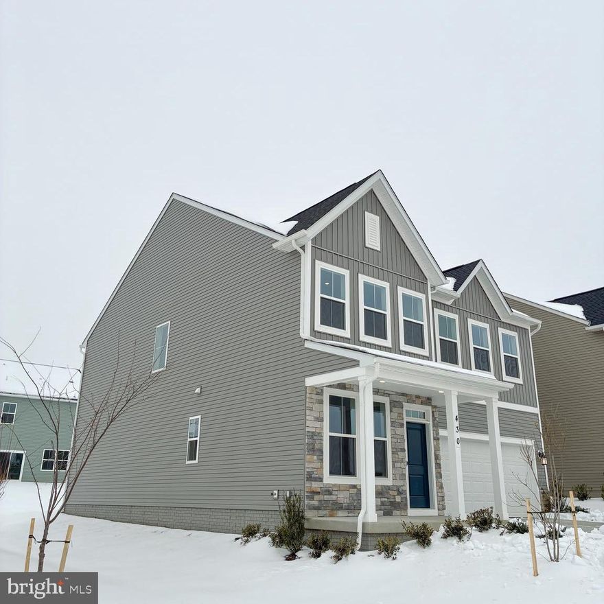 Welcome home to this beautifully designed new construction by Lennar, located in the desirable Red Clover Meadows community in Ranson. This spacious single-family residence offers 2,550 square feet of thoughtfully designed living space, 4 bedrooms, 2 full bathrooms, 1 half bath, and a 2-car garage.

Step through the front door into a welcoming foyer that opens to a bright living room at the front of the home — the perfect space for a home office, formal sitting area, or quiet retreat. Continue down the hall and the home opens into an expansive open-concept layout designed for both everyday living and effortless entertaining.

The heart of the home features a modern kitchen that flows seamlessly into the breakfast room and an impressive Great Room at the rear. This open gathering space is ideal for hosting holidays, game nights, or cozy evenings in. Large windows bring in natural light and create a warm, inviting atmosphere throughout the main level. A convenient powder room is also located on the first floor for guests.

Upstairs, retreat to the luxurious owner’s suite, complete with a private en-suite bathroom and dual walk-in closets, offering abundant storage and comfort. Three additional secondary bedrooms provide flexible space for family members, guests, or hobbies. A versatile loft area adds even more functionality — perfect for a media room, playroom, study area, or additional lounge space. A full hall bathroom serves the secondary bedrooms.

With its modern layout, generous living spaces, and prime Ranson location, this home offers the perfect blend of comfort, style, and functionality. 

Schedule your tour today and experience everything this beautiful new home has to offer.