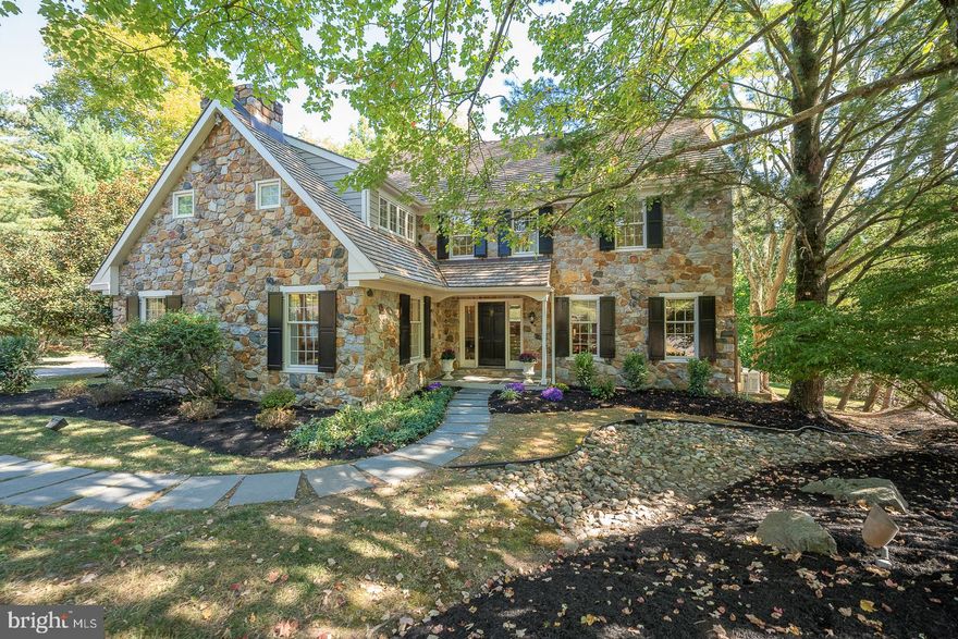 Welcome to 278 Stonegate Dr, a picturesque 4 Bedroom, 3.5 Bathroom home nestled on a serene 1.4-acre wooded lot in a desirable Devon cul-de-sac neighborhood.  This charming home showcases a striking stone façade and welcomes you with a spacious Foyer, leading to an expansive Living Room, Dining Room, Family Room, and Kitchen/Breakfast area—ideal for both everyday living and entertaining.  The step-down formal Living Room features tall windows with deep sills, a wood-burning fireplace with a detailed mantle, art lighting, and crown molding.  Adjacent to the Living Room is the Dining Room with a bay window that fills the space with natural light, complemented by crown molding and chair rail, creating the perfect ambiance for hosting guests. The Family Room features a full wall of built-in cabinetry and shelving, art lighting, a wood burning fireplace, glass sliders to the rear deck, and glass French doors to the Breakfast area providing a seamless flow for gatherings both indoors and out. The spacious Kitchen provides ample storage and a delightful breakfast area, highlighted by a large bay window with a deep sill that overlooks the tiered rear Deck. From here, you can enjoy serene views of the expansive yard and experience the privacy it offers. Additional main floor features include a Powder Room and a Laundry Room equipped with overhead cabinets and a utility sink. Adjacent to the Laundry Room is a quaint Mudroom with full-height glass-paneled windows and a French door, offering direct access to the attached 2-Car Garage.
Upstairs, the oversized Primary Suite is a true retreat, complete with an en-suite Bathroom with vaulted ceiling and skylight, a spacious walk-in closet, and a private Home Office with French doors and a cozy gas fireplace. Three additional well-sized Bedrooms share a Full Hall Bath, and a pull-down Attic staircase in the hallway provides easy access to extra storage space.
The finished Basement is an entertainer's dream, featuring an enormous Great Room, a wet bar, and a Full Bathroom.  A few steps lead you to the bright Sunroom, providing additional living or dining space with ample natural light from wraparound windows, skylights, and a glass door that opens directly onto the rear deck, blending indoor and outdoor living effortlessly. There's also a separate unfinished Utility/Storage Room for added convenience.
The tiered Deck provides an ideal outdoor retreat, offering exceptional privacy and serene views of the yard. Its multi-level design creates separate spaces for relaxation and entertainment, allowing you to savor peaceful moments or host gatherings while enjoying the tranquil surroundings. Outdoor living is further enhanced by the expansive yard, complete with a fire pit area, a bridge over a charming stream, and beautifully landscaped front, side, and rear beds. 
Located within the award-winning Tredyffrin-Easttown School District and just minutes from major roads, shopping, and dining, this home offers the perfect blend of privacy and convenience. Don't miss this opportunity to own a stunning property in Devon! OFFER DEADLINE - Sunday Sept 29th by 3:00 pm. Decision to be made Monday at the latest. Sellers reserve the right to accept an offer at any time. Thank you for your interest in this property.
