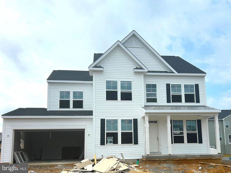 AUGUST DELIVERY! The Newbury II, BRAND NEW CONSTRUCTION in Berkeley County’s Premier Planned Community featuring a clubhouse, swimming pools, walking trails, lush landscaping, mountain views and more! Come enjoy 3 fully finished levels, almost 3000 sq. ft., with elevation 3 full front porch, 4 Bedrooms, 3.5 Baths, and 2 car garage with fully finished walkup basement including finished area 1, finished area 2 and finished basement bathroom. The Newbury II features a main level open concept with a formal living room and dining room upon entry, hallway with powder room and linen closet, family room open to the kitchen which features a spacious kitchen with level 2 mission style cabinetry in white with a large gray island, stainless appliances and level 2 quartz countertops with herringbone backsplash. Upstairs, the large primary bedroom features a tray ceiling, 2 walk-in closets and primary bathroom with with upgraded 12"x24" tile floors and walls. Three additional bedrooms, linen closet and upper level laundry complete this home.*photos may not be of actual home. Photos may be of similar home/floorplan if home is under construction or if this is a base price listing.