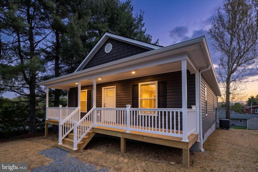 Step into this beautifully crafted 3-bedroom, 2-bath home built by Superior Siding & Home Improvements Inc. Thoughtful finishes are found throughout, including luxury vinyl plank flooring, granite countertops in the kitchen and baths, cathedral ceilings in the living room, recessed lighting, and both front and rear decks perfect for relaxing outdoors. Premium siding and quality construction add lasting value and peace of mind.