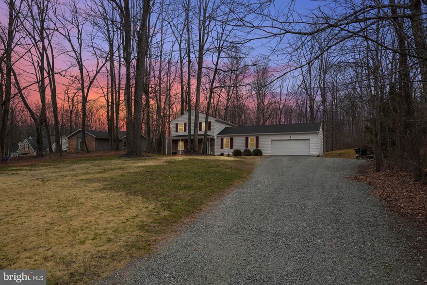 Welcome home to 9604 Leeta Cornus Lane! This adorable home has three levels to enjoy!  This 1 acre lot is nestled back in the woods and the backyard is just waiting for memories to be made around the fire pit. 

Walk in to the main level to a gorgeous living room with a fireplace! Beautiful hand-scraped wood flooring on the main level.   Step into the kitchen with gorgeous oak cabinets and be able to enjoy family time with this open living room / kitchen floor plan! Right off of the living room you will find an accessible main level bedroom and this home also features an accessible bathroom on the main level with a roll in shower. Make your way up this homes beautiful staircase to the primary bedroom and bath which is on the same level as the other two bedrooms upstairs! 

Finally head outside to enjoy this backyard oasis! Summertime has never looked better with a gorgeous wood deck and a fire pit for the whole family to gather around.  Septic tank is in front so a pool  could possibly be added to the backyard.

Updates include:  Garage interior updated 2020, crawl space encapsulated and sump pump added 10/2020, New electrical box 10/2020, All new electrical wiring upstairs 11/2021, New water pump 03/2022, and New water heater 04/2022.  New fridge and dishwasher in 2023.  Septic was pumped and inspection in August 2019.  Roof, HVAC, gutters, and garage doors were installed just prior to current owner purchasing in 2019.  Seller needs a short rent back through the end of May.  "HOA"  is really only a road maintenance agreement.  

Schedule your showing today!