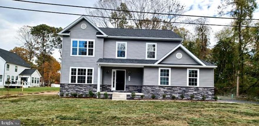 NO WAITING--THIS New Build is Available for IMMEDIATE DELIVERY!  BRAND-NEW Home has a WATERVIEW from Every Room and Every Bedroom located on the front side of the house, as waterfront homes are directly across the street!  Perfect for entertaining, the Large Family Room (with fireplace!) adjoins the chef-inspired kitchen, hosting beautiful white cabinetry!  Cherished memories await with the Grand sized kitchen island, complete with seating and upgraded granite countertops--the true "heart" of the home. 
A separate formal dining and living room also share this main level floorplan.  OR, make use of one of the rooms as a home office or playroom!  Upstairs, the Primary Bedroom is a true retreat, featuring a spacious walk-in closet. The spa-like primary bathroom with dual vanities, large soaking tub AND separate custom tiled shower are so inviting!   Let's not forget about the 3 Generous sized Secondary Bedrooms, sharing another tastefully designed bathroom and featuring a decorative accent window to allow for natural light.  The details throughout this house do not go unnoticed! Need more space??  The full basement is MASSIVE and awaits your vision, and a 3 piece bathroom plumbing rough in is already present.  There's plenty of parking with the 2 car side load attached garage and large driveway.  This home sits upon a large, flat and usable .34 acre parcel, so definitely some elbow room between neighbors!  The communities among Point Pleasant attract boaters and water lovers alike and waterfront restaurants are within walking distance.  NO HOA!  But there's more!  Builder is offering $10,000 towards a Buy-Down Rate or Closing Help!