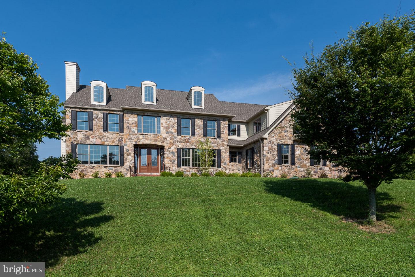 This Home is Absolutely Flawless--Easily the Most Sophisticated New Construction Available in Unionville-Chadds Ford School District! Extraordinary stone & Hardiplank home in Parker Preserve, a new home community crafted by Anthony Dambro, a well-respected longtime homebuilder in Chester and Delaware Counties. Ideally located in Pennsbury Township, this 5 BR, 5.2 BA Lenape model is beautifully sited on a private cul-de-sac with dramatic views and warm natural light. Words simply don't do this property justice--its thoughtful design, impressive usable space, and attention to detail are phenomenal. Elegant see-through foyer entry with flanking formal living and dining rooms with arched windows and distinctive moldings. Sprawling kitchen with only the finest amenities, including Century "Vassar House" cabinetry, Wolf six-burner cooktop and double oven, two sinks, furniture-style Subzero, and polished granite, open to both the morning room and family room with access to deck and lovely views. Truly incredible butler's pantry with granite, large sink, and wine refrigerator. Main floor study plus sunroom with access to deck. Master suite with sitting room, lavish ensuite bath, walk-in closet and additional closet. Two Princess suites, one with balcony. Two additional bedrooms share Jack & Jill bath. Second floor laundry with granite, abundant cabinetry, and sink. "Signature" Dambro finished walk-out lower level with all of the bells and whistles--theater room, expanded wet bar with dishwasher and wine refrigerator, and full bath. Three-car garage with stone columns at driveway entrance. Join a vibrant community and experience the quality of a Dambro home! Immediate Delivery is Possible.