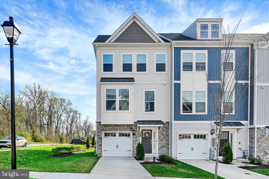 Welcome to your new home in Water’s Landing, an end-unit townhome filled with natural light and a layout that flows comfortably across each level. The entry level offers a flexible space that can be used as a living area, home office, or recreation room, finished with a blend of carpet and LVP flooring and walkout access to the backyard. The main level features an open kitchen, dining, and living area with stainless steel appliances, a spacious island, LVP flooring, a stylish backsplash, and neutral finishes throughout, creating a space that works well for both living and gatherings. Upstairs, comfortable bedrooms and full baths complete the upper level, while a private deck extends the living space outdoors and an attached garage adds convenience. The home is within walking distance to a community dock and pier, offering opportunities for sightseeing. All this home needs to feel complete are your personal touches.