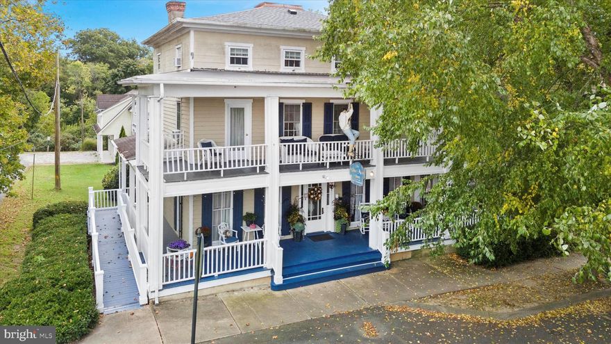 PRICE ADJUSTMENT!!
Step Back in Time at the Blue Max Inn
Welcome to the Blue Max Inn, a charming and historic Bed & Breakfast nestled in the heart of Chesapeake City, Maryland. This beautiful Victorian Inn offers a unique blend of old-world elegance and modern comforts, making it a beloved retreat in Chesapeake City which is along the Chesapeake and Delaware Canal.
Operating under the same ownership for over 20 years, the Blue Max Inn is a rare opportunity to own a piece of local history. The main inn features nine bedrooms and ten bathrooms spread across three floors, with a bathroom and office located in the walk-out basement. The main floor boasts a fully equipped kitchen, formal dining room, breakfast room, main parlor, and two luxurious suites—The Lindsey Suite and Honeymoon Suite. At the front of the inn, a grand porch invites guests to relax and soak in the sights and sounds of this picturesque waterfront town.
Guests and residents alike enjoy Chesapeake City’s quaint shops, fine dining, and rich historical charm.
Included with the property is a separate Carriage House, located just down the street on 3rd Street, yet still part of the same parcel. Currently serving as the owner’s residence, the Carriage House features a spacious living room with a gas fireplace and cathedral ceiling, a full kitchen, a large bedroom with a walk-in closet, and a luxurious bathroom complete with a jetted tub and walk-in shower. Additionally, it includes a three-car garage and a private parking lot behind the building. Adding additional parking to the Inn.
The property is zoned Village Center, offering flexibility for various uses—from continuing its operation as an inn to converting it back into a single-family home. For specific zoning information and possibilities, please contact the Town of Chesapeake City.
Whether you're looking to run a successful inn, launch a new business, or create a stunning private residence, the Blue Max Inn offers endless potential. Come see all that this remarkable location has to offer—and make it your own!