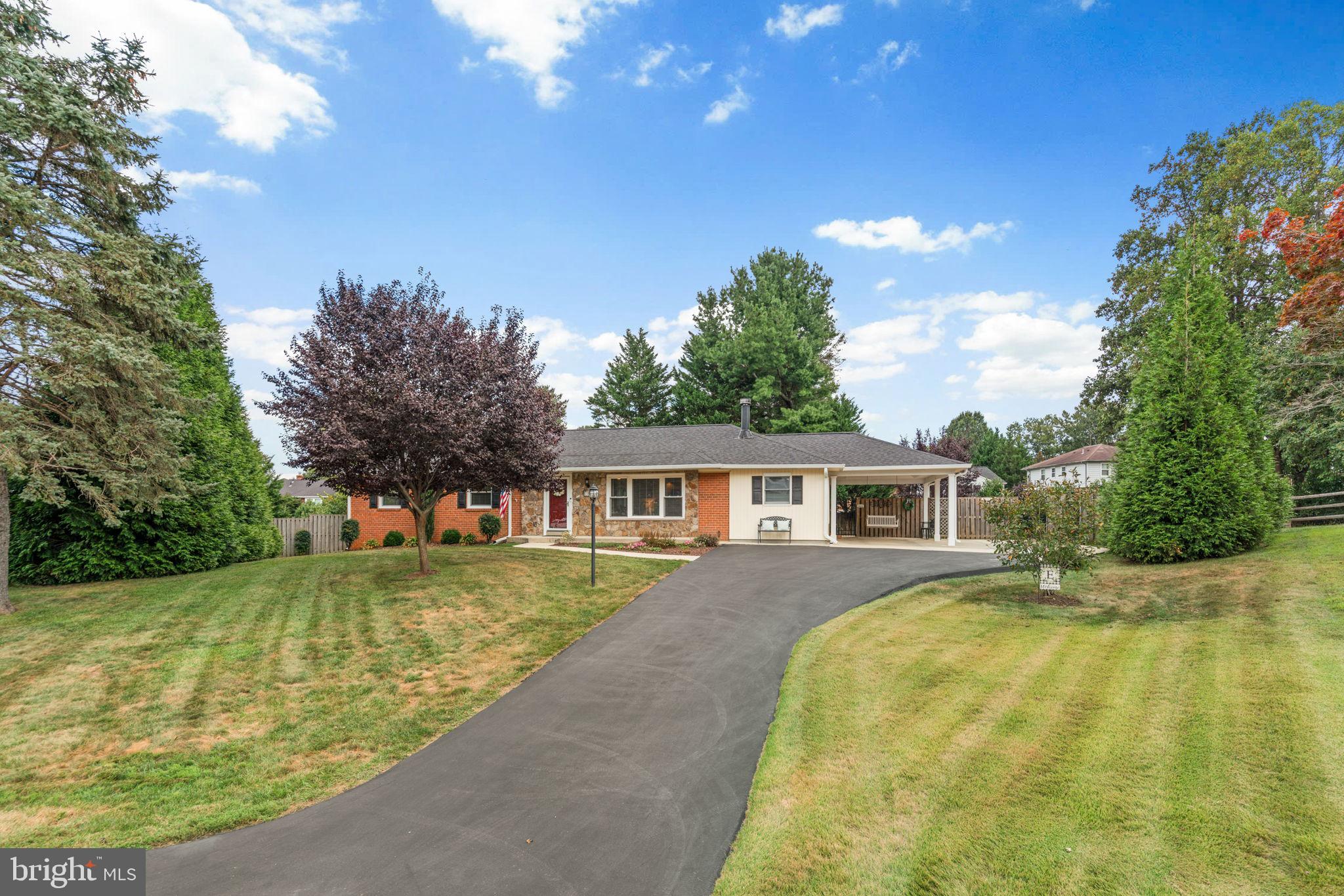 Welcome home to this absolutely stunning, totally turn-key home with all the amenities you have been waiting for. The front walk has been redone and leads you past the beautiful stone front. Upon entering, you will notice the pride of ownership immediately. Freshly redone hardwood floors carry through most of the main level. Tasteful and timeless tile has been installed in the kitchen, and two flex spaces! The sunroom addition has been used as a TV room, a dining room, and is currently being used as a second living space. Just off the kitchen, the converted carport is a dream space full of possibilities. Currently used as a mud room, it could be the perfect home office, laundry room, bonus storage room, playroom, and so much more! The updated kitchen features timeless white cabinets, granite counters, a skylight, and sightlines through to the living room, dining room, and views of the back yard. One level living at its finest, this home features three large bedrooms and two full bathrooms on the main level! The primary suite has been reconfigured to add two large closets, an expanded en-suite bathroom, and a storage/tv nook! Downstairs you will find the perfect basement for entertaining. A fireplace and second living room greet you as you enter the basement area. Don't miss the expanded windows, allowing loads of light into the basement! Beyond the fireplace is the perfect home gym, playroom, or storage area! Don't miss the half bath down here! The laundry area is smartly done allowing plenty of hang space, leaving room for a very large storage room at the far end of the basement. The perfect home in the perfect location, you won't want to miss this one!
Recent updates include:*Hot water heater 2025 *Microwave 2024 *Refrigerator Feb. 2024 *New Architectural Roof 2018 *Hot Water Heater 2025 *Chimney Liner 2025 *Replaced Motor in Heating Unit Jan. 2023 *Radon Mitigation System *Oversized Gutters