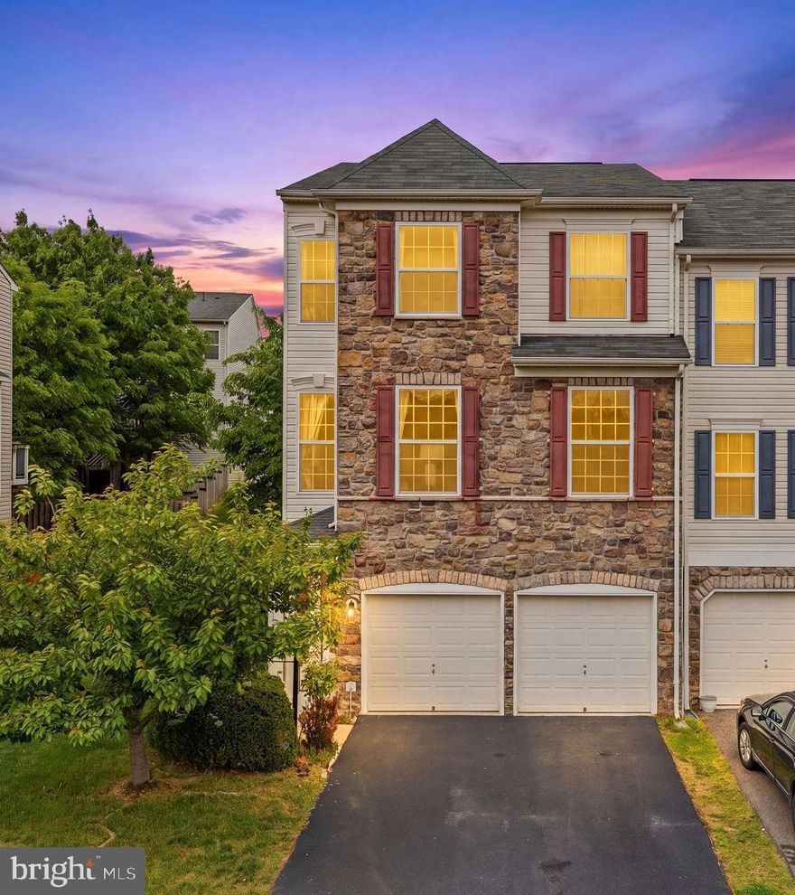 MULTIPLE OFFERS HAVE BEEN RECEIVED. PLEASE SEND YOURS NO LATER THAN 10 AM MONDAY, MAY 4TH. Step inside this end-unit townhome that lives like a single-family home, where every detail has been thoughtfully considered—crown molding, wainscoting, custom blinds, and model-home finishes set the tone from the foyer, while extra side windows flood the home with natural light.

Over 3,000 finished square feet unfold across three light-filled levels, with picturesque views of the community pond right out front. The open main level is designed for both everyday living and entertaining, featuring a gourmet kitchen with gas cooking—every chef’s dream—and updated appliances throughout.

Upstairs, retreat to a spacious primary suite with a walk-in closet, en-suite bath, and your own private terrace. Two additional bedrooms offer flexibility for guests, work, or hobbies, while the bedroom-level laundry room adds everyday convenience.

The entry level offers a full bath, a recreation room, and a bedroom anchored by a cozy fireplace—the perfect setting for quiet evenings, movie nights, or extended stays.

Step outside to two composite decks and private outdoor spaces on every level, all overlooking a large, fenced backyard framed by mature trees for added privacy. An attached two-car garage and ample guest parking complete the package.

Located in the Stone Ridge community, enjoy resort-style amenities including three pools, a fitness center, clubhouse, tennis courts, basketball court, miles of trails, and more.

Furniture is negotiable—move in and enjoy.