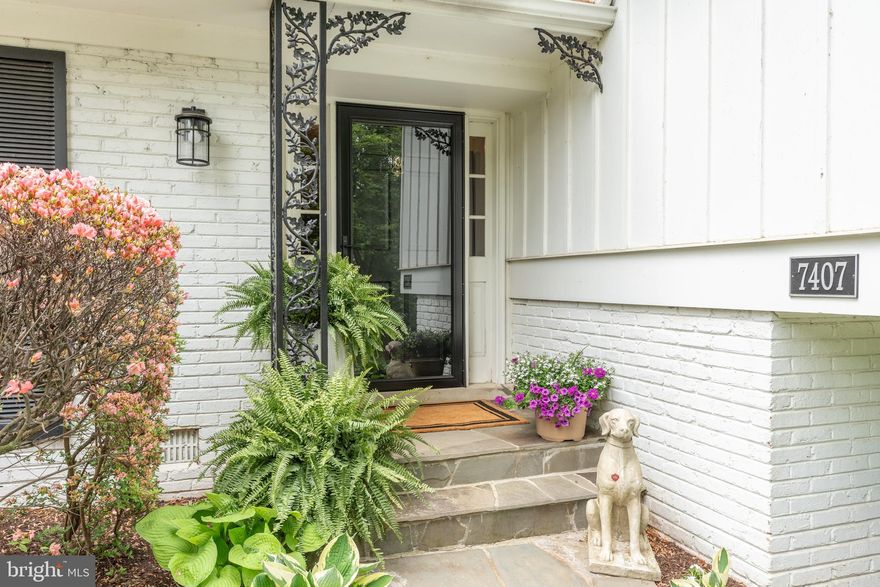 Perched atop a gentle knoll in the highly sought-after West Langley neighborhood of McLean, this exquisitely renovated residence offers both charm and convenience. Ideally located within walking distance to Churchill Elementary, Cooper Middle, and Langley High School, this exceptional home blends timeless elegance with modern upgrades to create a truly inviting living experience.

Upon entering the main level, you are greeted by gleaming hardwood floors that flow seamlessly throughout. The heart of the home is a completely reimagined gourmet kitchen, thoughtfully designed with quartz countertops, premium Jenn-Air stainless steel appliances, classic subway tile backsplash, a wine refrigerator, and an abundance of custom cabinetry—perfect for both everyday living and entertaining.

Adjacent to the kitchen, you'll find a stylishly updated powder room and a functional laundry room. The formal living room exudes warmth and sophistication with a traditional wood-burning fireplace, while the spacious dining room is ideal for hosting memorable gatherings. The cozy family room features a second wood-burning fireplace, a wall of custom built-ins, and elegant French doors that open to a serene outdoor sanctuary.

Step outside to discover a fully fenced, private backyard oasis, showcasing an expansive pergola, meticulously designed landscaping and hardscaping, and a built-in swimming pool complete with a diving board —an idyllic setting for relaxation or outdoor entertaining.

Upstairs, the home offers four generously sized bedrooms and two fully renovated, spa-inspired bathrooms. The luxurious primary suite is a true retreat, enhanced by professionally designed custom closets by Capitol Closets.

The lower level is equally impressive, featuring a bright and spacious media or recreation room with extensive built-in shelving and direct access to the exterior. Completing this level is a two-car attached garage, providing ample storage and convenience.

This home is a rare offering—where thoughtful design, prime location, and modern amenities converge to create the perfect place to call home.

Note: Tax record square footage does not reflect the 572SF in Lower Level Media Room. Owner is real estate licensee.