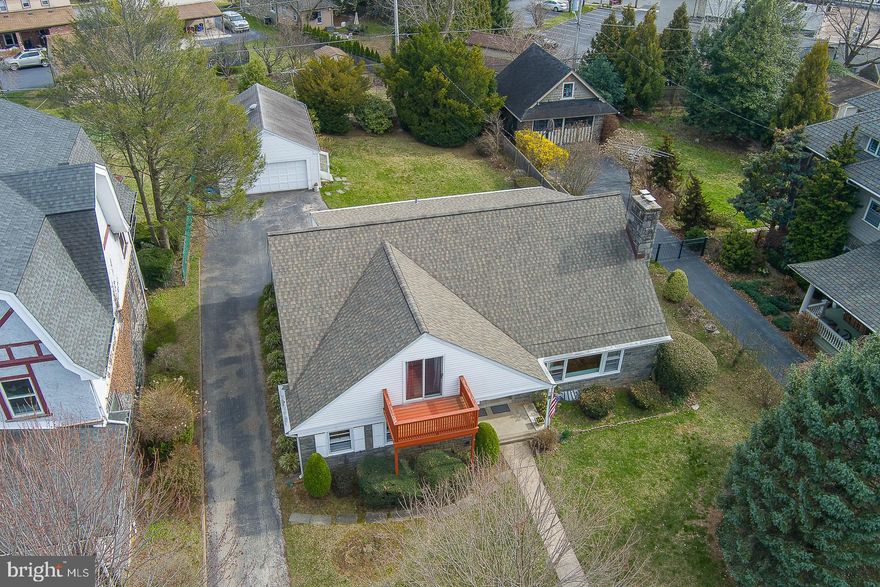 Versatile Duplex with Single-Family Conversion Potential in Haverford School District!
Welcome to this unique and spacious property offering the flexibility to be used as a duplex or easily converted into a 4–5 bedroom single-family home with almost 3000 sq ft—perfect for homeowners and investors alike.
The main level features an expansive living room highlighted by a cozy wood-burning fireplace, seamlessly flowing into a bright and sun-filled dining room—ideal for everyday living and entertaining. The well-appointed kitchen offers abundant counter space, ample cabinetry, and a center island to meet all your culinary needs. Just off the kitchen, a charming sunroom provides access to the large, level backyard from either side, creating a perfect indoor-outdoor connection.
The primary bedroom is generously sized with a walk-in closet and private bath. Two additional rooms include a spacious second bedroom and a third bedroom currently used as a home office, along with a hall bath. Beautiful hardwood floors run throughout the main level, adding warmth and character.
The lower level is semi-finished and offers a flexible space for storage, a workshop, and includes a crawl space for additional storage needs.
The second level is a fully functional apartment with a private entrance, featuring a living room, dining room, kitchen, full bath, bedroom, and abundant closet space. Enjoy outdoor relaxation on the private second-floor deck—perfect for tenants or extended family.
Step outside to a rear patio and expansive yard, ideal for entertaining or relaxing. The detached garage has been thoughtfully converted into a heated, versatile bonus space with pull-down attic storage—perfect as a home office, gym, studio, “man cave,” or “she shed” — with the option to convert it back to a 2-car garage.
Conveniently located with easy access to major roadways, shopping, and dining, this home offers incredible flexibility—live in one unit while generating rental income from the other, or transform it into your dream single-family residence.  A rare opportunity in a highly desirable location—don’t miss it!