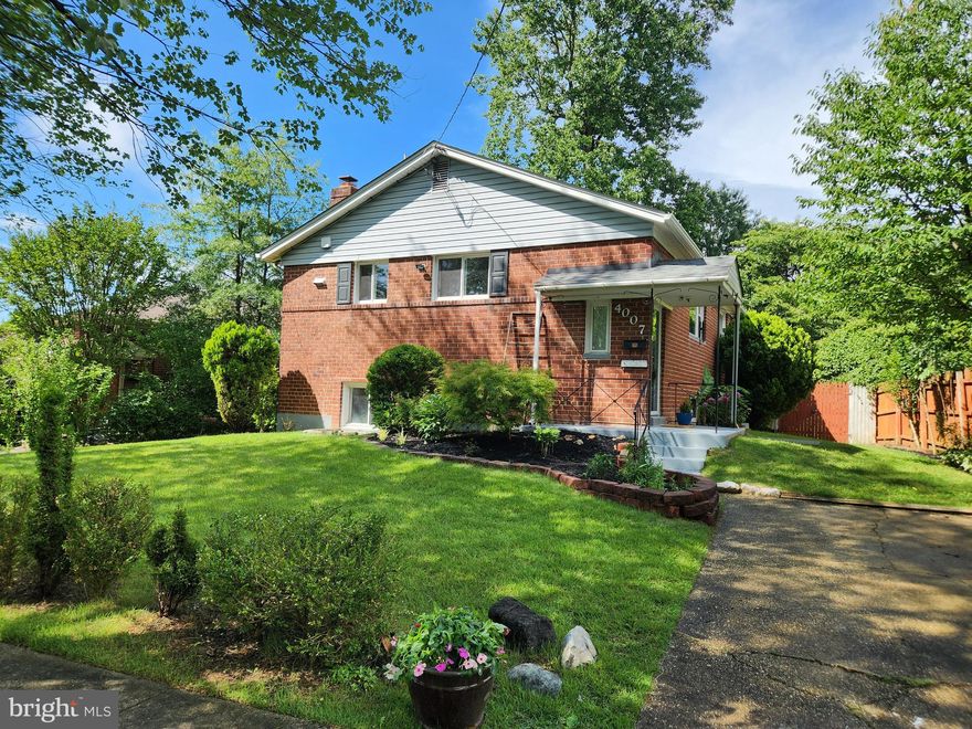 *** Move-in ready home offers a perfect mix of space and updates in a convenient location.
  Lovely solid brick, 4-bedroom, 2-bath home is nestled on a quiet street with a fully fenced yard, mature trees, and beautifully landscaped grounds on all sides.
There are refinished hardwood floors throughout the upper level and a spacious living area with a wood-burning brick fireplace with raised hearth on the lower level. The home offers a warm, comfortable layout with updated finishes throughout, including fresh neutral paint (2025) and new carpet (2021). The kitchen was previously remodeled and remains functional and inviting.
 Large back deck extends from the rear of the home, with peaceful views of the tree-lined yard for maximum privacy!    Cozy covered sunroom nook sits just off of the back deck.   Fenced backyard features mature fig and Asian pear trees, and a tool shed beneath the deck adds bonus storage.
The lower level includes custom tile flooring, a renovated full bath with spa-style shower (2019), and a flexible space for a family room, guest area, or home office. A dedicated laundry room with added utility sink was added in 2021. 

 Other recent updates include:

* HVAC system (2021)
*Roof (2017)
* Energy-efficient vinyl-clad windows (2018)
*New light fixtures (2025) 
*New front door (2017) 
*Hardwood landing in lower level (2020)

Additional highlights include a covered front porch, brick exterior on all sides, and a newly installed fence door.  Enjoy easy access to nearby hiking and biking trails, parks, grocery stores, and schools.