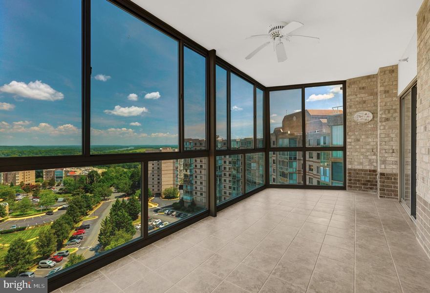 Picture yourself in this  corner penthouse unit flooded with daylight and spectacular views!  Welcome to the award winning over 55 resort community called Lansdowne Woods of Virginia.   This 2-bedroom/ 2 bathroom condo has almost 1400 sq. ft. plus a glass-enclosed balcony with sweeping views of the Potomac River and Sugarloaf Mountain.   The Blue Ridge N plan has a desirable split bedroom layout providing separation of sleeping areas with an expansive eat in kitchen and a great room as the center of the home.  The bright and sunny eat-in kitchen has counter space galore, a full wall of custom cabinetry in the breakfast room, a large picture window to soak in that breathtaking view, and access to the living and dining rooms.   Unwind in the light-filled sunroom with your morning beverage to watch the sunrise over the Potomac River and the surrounding greenery.  If you are worried about having enough storage space, don't you fret- you won't lack for storage with 6  incredible closet options throughout the condo.   An indoor deeded garage space and a climate controlled storage room are icing on the cake! You can own in Lansdowne Woods if you are over 18, but you cannot live here.    If you are over 45 years old,  you may enjoy living  in this award winning adult community! Your condo fees include the resort-like amenities, hot and cold water, internet, phone, cable TV, trash service, HVAC inspections, window washing,  community bus transportation, along with 24 security.     Here at Blue Ridge and Lansdowne Woods, there’s always something to do! Join your neighbors for weekly card games,  attend happy hours, coffee time, karaoke, bingo, dance parties, pot lucks,  mix and mingles and get togethers on the patio, in the party room or in the clubhouse.  Catch a film, lecture, or concert in the theatre.   This vibrant campus has over 40 clubs, ongoing year-round activities, an indoor pool and hot tub, rooftop tennis and pickleball, a fully equipped fitness room, an exercise studio, woodworking, ceramics, art and music studios, a hair and nail salon, a full restaurant/bar, EV charging stations and so much more.  You may also choose to just enjoy the serenity of your own condo and this  carefree lifestyle.   Lansdowne Woods provides the best of both worlds!
Close to Dulles Airport, One Loudoun, Sterling, Ashburn, and Leesburg,  dining and shopping.  For those still working, you are close to major commuter routes and the metro.   Come see why Blue Ridge 1117 at Lansdowne Woods of Virginia is the perfect place to call home.