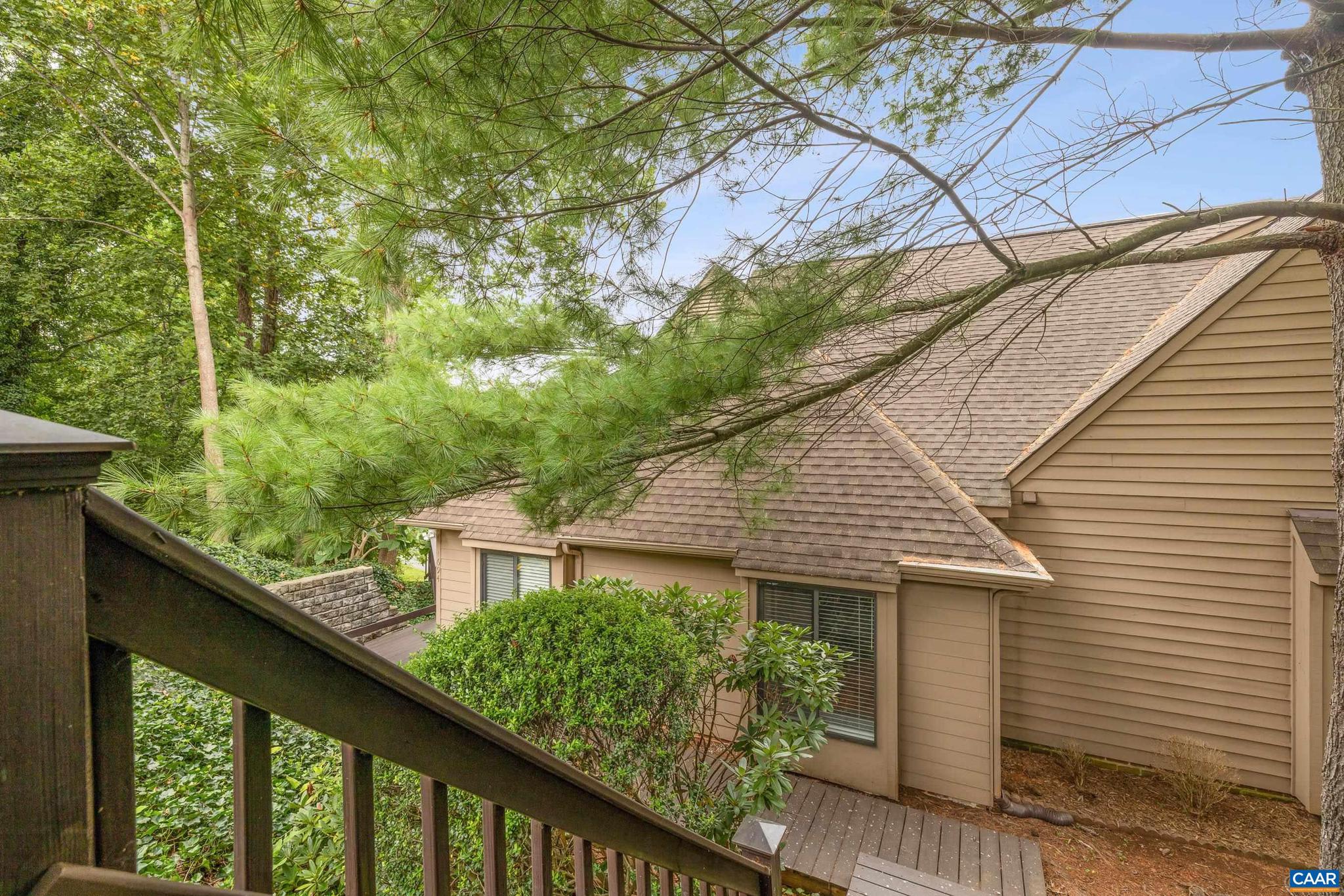 Ideally located and extraordinarily private, this one-level home is completely updated with hardwood floors in the living and dining areas, ceramic tile in the kitchen and baths, and stainless appliances. A large, 490-square-foot, custom-built deck is perfect for outdoor entertaining. The master bedroom has its own private balcony facing west with wonderful winter views, two closets, a spacious bath, and a conveniently located washer/dryer. Enjoy easy access to the outdoors with a short walk to the Biscuit Run Park trails. The neighborhood HOA provides peace of mind by covering roof, siding, exterior painting, and grass mowing. All of this is less than 5 minutes from Wegmans, 5th Street Station shopping and dining, three miles to the UVA Medical Center and Historic Downtown Mall, and less than 15 minutes to Martha Jefferson Hospital on Pantops. The home is surrounded by vineyards, historic landmarks, and walking trails. OPEN HOUSE Saturday, August 23rd from 11AM - 1 PM and Sunday, August 24th from 11AM - 1 PM!,Formica Counter,Wood Cabinets
