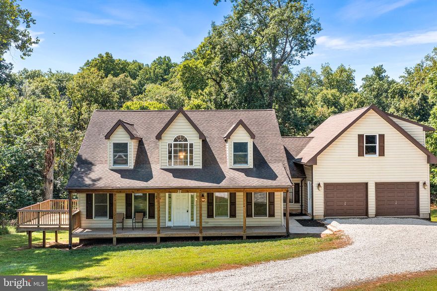 This amazing, Turkey Point home is tucked away, 300 feet from the water (Elk River) with lots of space and privacy! Almost like new, there's fresh paint throughout and new carpet too. 30 foot foyer greats you as you enter from the wonderful front porch. Separate living and dining rooms at the front of the home. The living room provides access to the new 14x16 deck. The kitchen is equipped with brand new SS appliances and oak cabinets. There's and eat in area perfect for watching the natural wildlife that visits from the MD State Park that the property backs to along with a screened in porch. A laundry closet that leads to the attached garage and stairs to the largest floored attic you have ever seen ( 26x24)! And just what you are looking for, the Primary bedroom with it's own full bath on the main floor too! Upstairs are 3 generously sized bedrooms and another full bath. Each bedroom has a large closet. The unfinished basement has loads of space and high ceilings, just ready for your finishing touches (along with a rough in for a bathroom) You will think this is new construction when you see this. Better Hurry!