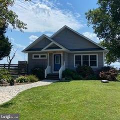 Enjoy beautiful sunrises and sunsets on your private beach. This adorable waterfront home has been meticulously maintained and renovated. Home features an open floor plan with stainless steel appliances, wood stove, murphy bed in spare bedroom, and a generator. When you are not relaxing on the beach, there is a hot tub for your use, if you desire. Home available month to month after first year. Pets accepted on case by case basis.