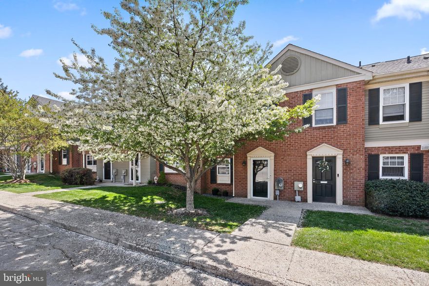 Welcome to 32 Yorktown Court, a bright and airy 2-bedroom, 2.5-bath home in the highly desirable Oxford of Blue Bell community.
The first floor offers an open layout featuring a kitchen with granite countertops and tiled backsplash, complete with an island that adds extra storage for pantry essentials, a cozy breakfast nook, or a spacious meal-prepping surface for a happy week ahead. You’ll also find a convenient powder room, a large dining area, and a spacious living room — all enhanced by stylish, low-maintenance luxury vinyl plank flooring that continues throughout the second floor.
The owners thoughtfully converted the first-floor storage area into a cozy home office, perfect for remote work or focused projects. The living space flows seamlessly onto an extended patio, ideal for barbecuing, lounging in a hammock, or entertaining guests. A newly installed outdoor outlet adds flexibility for additional lighting, outdoor cooking equipment, or seasonal décor, while mature trees provide privacy, year-round greenery, and beautiful pink blooms each spring.
Upstairs, you’ll find two generously sized bedrooms, each with its own renovated full bathroom. The primary suite features two separate closets and a private bath with a double vanity and fully-extended drawer space. The second bedroom and hall bath are equally spacious and thoughtfully designed. A convenient laundry closet upstairs houses the newly installed washer and dryer. A recently added pull-down attic staircase provides access to full-width storage across the unit — perfect for seasonal items, holiday decorations, or activity gear.
Ideally located within the community, this home is just steps from the swimming pool, tennis and basketball courts, playground, dog park, and perfectly positioned between the two main school bus stops. Additional amenities include a 24/7 fitness center (with optional key fob access for a small fee), a scenic walking trail around a beautiful pond with a fountain.
Located in the award-winning Wissahickon School District, 32 Yorktown Court offers easy access to major highways like 476 and 276, and is close to shopping, dining, and entertainment options, including Plymouth Meeting Mall and Whole Foods.
Don’t miss the opportunity to enjoy comfortable, low-maintenance living in one of Blue Bell’s most vibrant and well-connected communities!