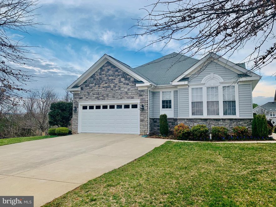 What a lovely, beautifully upgraded, spotlessly maintained, 2 level (Main level and Lower) home on a perfectly  private lot!  This lot has an extra 1/4  acre ( and driveway pad)  and is perfectly  placed so Mother Nature's ample wildlife will be on show every day!  A center prep island, stainless appliances, and upgrades enhance a kitchen which extends to the breakfast area.    The generously sized  living room, dining room, sun room and bed rooms are filled with the comforting warmth of sunshine!   This home feature a dance studio in the lower level with a full wall of practice mirrors. Additionally,  the lower features a workshop, bedroom, full bath and huge storage space.  The screened porch and deck are perfect for casual entertaining.  This an ACTIVE ADULT community (One permanent resident living in the home MUST be age 55)  Community shopping, medical, entertainment, restaurants are nearby.