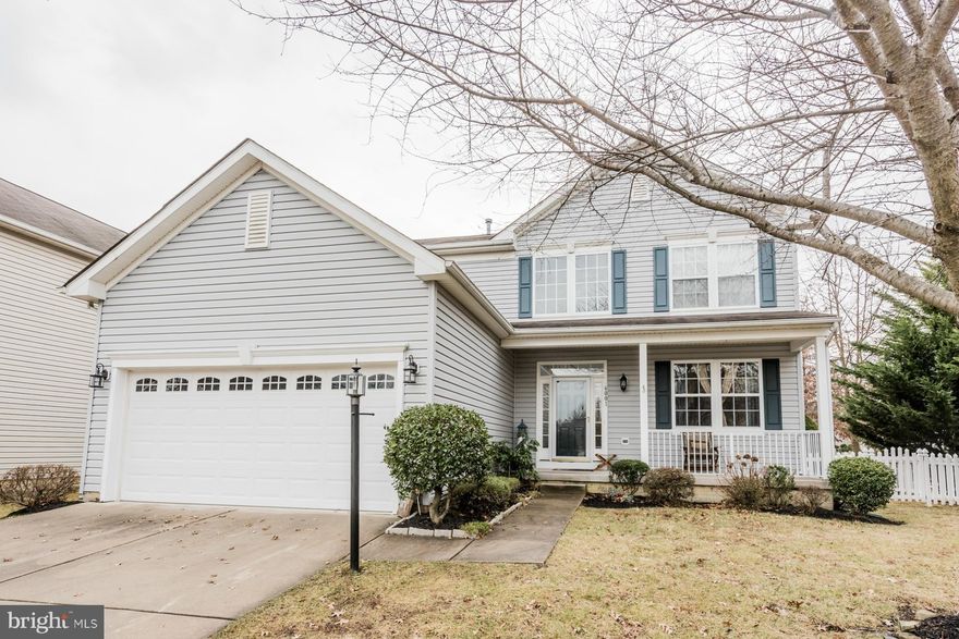 Impeccable 3 level colonial on corner lot. Front porch, hardwood foyer, LR w/crown molding & DR w/chair rail & Crown, Fully appointed kitchen & breakfast area - SS appliances, subway tile backsplash,42" maple cabinetry, deck and fenced yard. Owner's suite w/walk-in closet, super bath w/ dual vanity, sep shower & tub. Rec room & games/exercise area.Home Warranty provided. No CPRA. Price Reduction