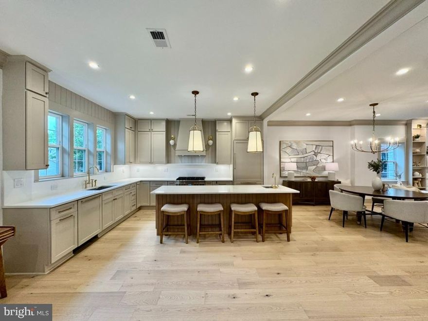 CATERED OPEN THURSDAY APRIL 30TH 4:30-7PM. Step into a masterpiece of modern elegance in the heart of American University Park. Completely reimagined from top to bottom, this stunning home offers 6 spacious bedrooms and 4.5 impeccably designed bathrooms, striking the perfect balance between sophisticated style and everyday comfort. Whether you're hosting a lively gathering or enjoying a quiet evening, this home is tailored for both grand entertaining and serene living.

Every inch of this residence has been thoughtfully transformed with meticulous attention to detail. The main level boasts an open, airy layout featuring wide-plank oak floors, a custom kitchen with sleek stone countertops, a wine bar, and a living room with a cozy fireplace. French doors in the family room lead to a private backyard oasis, complete with a garage wired for an electric vehicle charger. Need flexibility? A main-level office doubles as a legal bedroom with an adjacent bathroom, while the spacious mudroom, complete with a walk-in closet, keeps life effortlessly organized.

The fully finished basement offers even more to love—an additional bedroom, a full bathroom, a wet bar, and a versatile family room. Upstairs, you'll find four generously sized bedrooms, including an extraordinary primary suite that features dual walk-in closets, a spa-like bathroom with double vanities, an oversized shower, and a private water closet. For ultimate convenience, a laundry room is located on this level.

Situated within walking distance to both the Tenleytown and Friendship Heights Metro stations, this home ensures an easy commute while keeping you close to some of the best amenities DC has to offer. Top-rated schools like Janney Elementary and Georgetown Day School are nearby, and the neighborhood buzzes with dining and shopping hotspots like Millie’s, Clyde’s, and Target.

This home is more than just a place to live—it’s a lifestyle. Discover the perfect harmony of urban convenience and residential tranquility in this exceptional Washington, DC gem.