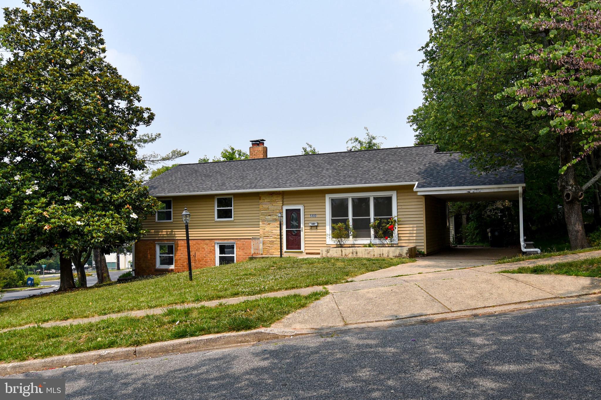 Light filled 3 bedroom 2 full bath split level located in the heart of New Carrollton. Conveniently located near the Orange, Green, and proposed Purple Metro lines, nearby bus routes, and major highways including 495, route 50, Balt-Wash Parkway and more. Rarely do you find such a suburban hideaway tucked into the heart of the DC Metropolitan area. This home boasts a brand new roof 2023, new refrigerator, hot water heater and dishwasher 2023, recently updated windows, kitchen and flooring on the entry level. You will enjoy the high-end details with the crown moulding, chair rail moulding, granite countertops and stainless steel appliances. A large family room with a fireplace offers ample space for entertaining or just relaxing on a quiet evening. The generous patio outside of the french doors enhances your back yard experience during any season. Finally you will find your own washer and dryer in the laundry / utility room on the lower level of this split level home. Enjoy.