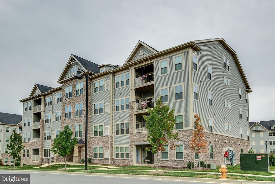 Beautiful 2 level penthouse condo with upscale finishings.   Open concept with a spacious primary bedroom suite with luxury bath, 2nd bedroom and hall bathroom.   Kitchen & bath cabinets are Windsor Painted Hazelnut w/satin nickel hardware, granite countertops, GE stainless steel appliances.   The loft area is perfect for a home office or bonus room.   Large closets, energy efficient windows, energy saver HVAC and  tankless hot water.   Elevator building.  Access to Lake Linganore and all that has to offer: lakes and beaches, fishing and boating, scenic hiking trails, swimming pools, p0laygorunds and picnic areas, sports fields, basket ball, volleyball and tennis courts, and MORE!  Ready to move in - model home condition.