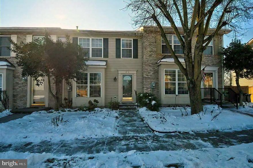 This 3 bedroom 3 1/2 bath townhome is waiting for you to put your finishing touches on it to make it your own! The family room/dining room combo boasts hardwood floors and plenty of space! Enter the updated kitchen featuring stainless steel appliances, granite countertops and painted cabinets.  You will find your laundry off of the kitchen as well. Walk out onto to your spacious deck from the kitchen and access the patio below. There is a guttering system under the deck to keep the patio dry for those summer BBQ's! On the upper level you will find 3 bedrooms and 2 full baths.  The primary bedroom has a walk-in closet and a full bath. In the fully finished basement, there is plenty of room for entertaining your friends and family.  Check out the built-in bar and entertainment center! You will find the 3rd full bath in the basement with a tiled walk-in shower.  Walk out the basement door right onto your covered patio and into the fully fenced backyard! The community has a walking path, playgrounds and tennis courts.  Close to downtown Winchester and a great commuter location! Don't miss out, schedule your showing today!