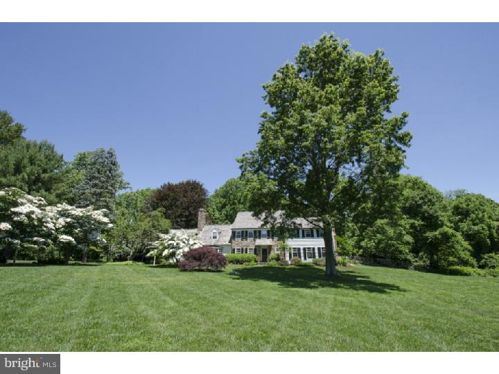 Just what everyone's been waiting for...the quintessential, classic American iconic homestead!!! With stately presence and exuding charm, this Belber-built colonial characterizes Chester County farmhouse styling that transcends time. Long, tree-lined driveway and impressive front yard on picturesque four acres will captivate buyers seeking an unparalleled Radnor Hunt Country location. Situated on one of the most notable addresses in Willistown, this country home offers widespread appeal. From stone, stucco and board & batten siding to newer cedar shake roof complete w/cooper gutters, this home delivers rich, authentic architectural styling. Stunning and newer in-ground pool with stone coping create perfect backdrop to pergola-covered terrace and fenced yard. Inside, extensive renovations and updates blend seamlessly creating Inviting rooms w/pleasant proportion and full of detailed mill work, moldings, transoms and paneled walls, all finishes today's buyers appreciate. Gourmet kitchen features high-end professional-grade appliances, (including two dishwashers, Wolf six-burner range), expansive granite island and countertops w/custom inset Rutt cabinetry, breakfast room area with doors to terrace...all w/exposed beams makes preparing and serving meals a pleasure...not to mention wet bar area with wine refrigerator and computer/office nook. Asian Pecky cypress paneling lines fireside family room walls w/oversized picture window & built-in seating, overlooking breathtakingly beautiful grounds. Fireside living room w/wall of wooden French doors accessing poolside terrace, formal dining room w/hand-painted hunt scenes and custom recessed paneled wainscoting are just a few hallmarks that make this distinctive home hard to pass up. Front and back staircases access second floor w/five bedrooms on same level and three full and recently remodeled bathrooms with stunning tile work, finishes and appointments. Walk-up unfinished third floor means further expansion possibilities exist. Bring your horses or antique cars as property offers adorable multi-purpose stable/outbuilding. It doesn't get any better! Opportunity is knocking.