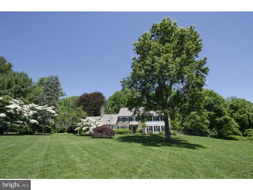 Just what everyone's been waiting for...the quintessential, classic American iconic homestead!!!  With stately presence and exuding charm, this Belber-built colonial characterizes Chester County farmhouse styling that transcends time. Long, tree-lined driveway and impressive front yard on picturesque four acres will captivate buyers seeking an unparalleled Radnor Hunt Country location. Situated on one of the most notable addresses in Willistown, this country home offers widespread appeal. From stone, stucco and board & batten siding to newer cedar shake roof complete w/cooper gutters, this home delivers rich, authentic architectural styling. Stunning and newer in-ground pool with stone coping create perfect backdrop to pergola-covered terrace and fenced yard. Inside, extensive renovations and updates blend seamlessly creating Inviting rooms w/pleasant proportion and full of detailed mill work, moldings, transoms and paneled walls, all finishes today's buyers appreciate. Gourmet kitchen features high-end professional-grade appliances, (including two dishwashers, Wolf six-burner range), expansive granite island and countertops w/custom inset Rutt cabinetry, breakfast room area with doors to terrace...all w/exposed beams makes preparing and serving meals a pleasure...not to mention wet bar area with wine refrigerator and computer/office nook.  Asian Pecky cypress paneling lines fireside family room walls w/oversized picture window & built-in seating, overlooking breathtakingly beautiful grounds. Fireside living room w/wall of wooden French doors accessing poolside terrace, formal dining room w/hand-painted hunt scenes and custom recessed paneled wainscoting are just a few hallmarks that make this distinctive home hard to pass up. Front and back staircases access second floor w/five bedrooms on same level and three full and recently remodeled bathrooms with stunning tile work, finishes and appointments. Walk-up unfinished third floor means further expansion possibilities exist.  Bring your horses or antique cars as property offers adorable multi-purpose stable/outbuilding. It doesn't get any better! Opportunity is knocking.