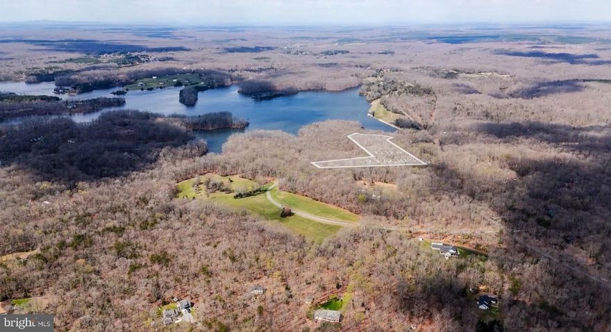 WATERFRONT - CHOOSE YOUR HOME - TO BE BUILT - NEW CONSTRUCTION - Introducing an exquisite waterfront opportunity to build your dream home in the picturesque Rosni Estates waterfront community of Fredericksburg. Nestled in a serene waterfront setting, this to-be-built masterpiece offers a truly bespoke living experience.

This example is the luxurious SMITH home design that includes 3 spacious bedrooms, and 3 elegant bathrooms spread across 2,704 square feet of meticulously crafted living space. The open-concept floor plan is enhanced with hard surface flooring throughout the main level, creating a warm and inviting atmosphere. The chef’s kitchen is a culinary delight, featuring quartz countertops, custom cabinetry, and top-of-the-line stainless steel appliances, all illuminated by modern recessed lighting.

Each home in Rosni Estates comes with a standard 3-car side entry attached garage, offering ample storage and convenience. Additionally, there is plenty of space to add personalized structures, should you desire. The exterior is accentuated with stylish stone water tables, adding a touch of elegance to the overall design.

With a limited selection of exclusive homesites, you have the freedom to choose from a curated portfolio of plans or bring your own vision to life. This is the essence of the Custom-Building Experience—if you can dream of it, we can help make it a reality.

Don’t miss this rare chance to create a haven that perfectly fits your lifestyle in a coveted location. Discover the endless possibilities of luxury living in Fredericksburg today. Photos are representative of the Bryton Homes Custom craftsmanship and finishes, they are not of the SMITH home design. Inquire about the other available lots and models in this community. *PHOTOS ARE OF A SIMILAR DALTON MODEL