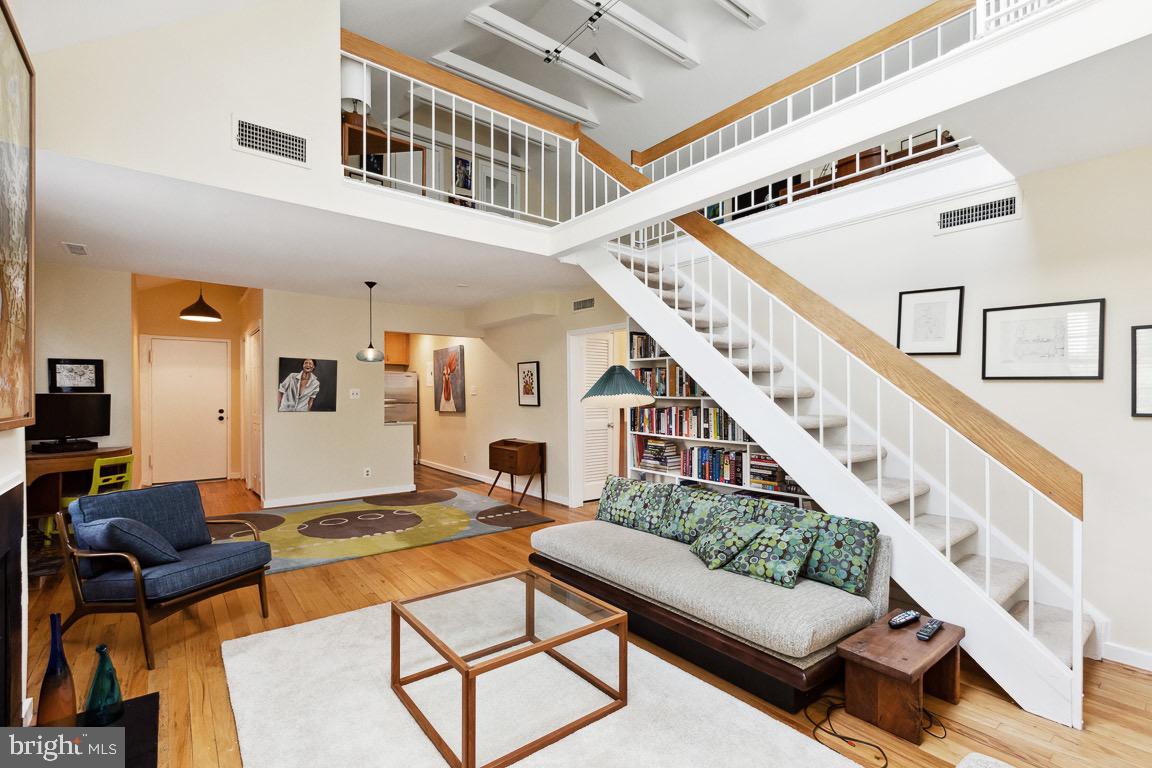 Beautiful & light filled 2br 1 bath condo in the desirable Rock Creek Gardens community. Home features charming loft space, two story ceilings, hardwood floors, a wood burning fireplace, plenty of closet space Kitchen has SS appliances, maple cabinets and ceramic tile floors. Rock Creek Gardens boasts amenities such as outdoor pool, gazebo + picnic area, bike storage room, on site property manager, and secured building entry. Great walkable location one block from dining, grocery, and fitness (such as Rock Creek Sports Club and Parkway Deli.) Easy access to green space of Rock Creek Park, plus Bethesda, downtown Silver Spring, and commuter roads to DC. Pet friendly and so close to rock creek park for runs and walks with your best friend!