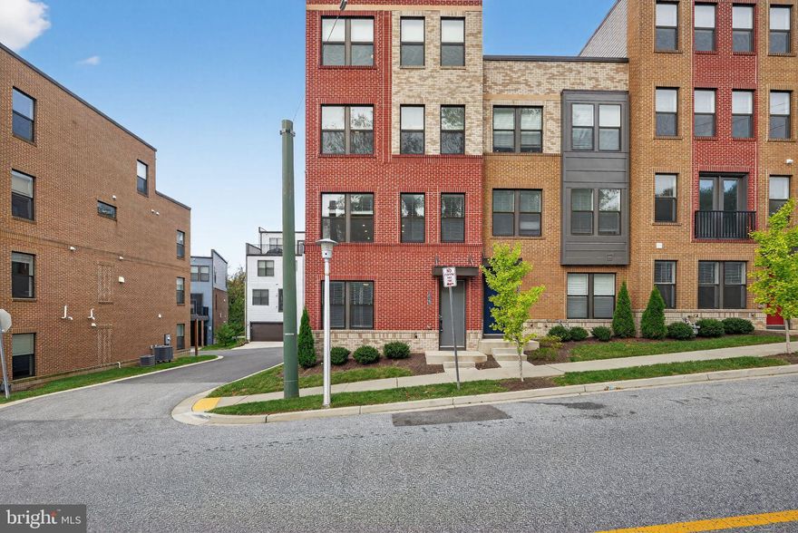 Welcome to 4347 La Plata Avenue — a modern 5-bedroom, 3.5-bath townhome in the sought-after Medfield neighborhood of Baltimore. Built in 2021, this home blends contemporary design with everyday comfort. The open-concept main level features high ceilings, abundant natural light, and a sleek kitchen with stainless steel appliances, quartz countertops, and an oversized island perfect for entertaining. Each bedroom offers its own ensuite bath, including a spacious primary suite with a walk-in closet and luxurious spa-style bathroom. Enjoy the convenience of a 2-car attached garage, low-maintenance living, and quick access to major highways.  Close to Union Craft Brewing, JHU, The Rotunda, and fine dining on the Avenue! Available for immediate occupancy! Call now to schedule your showing!