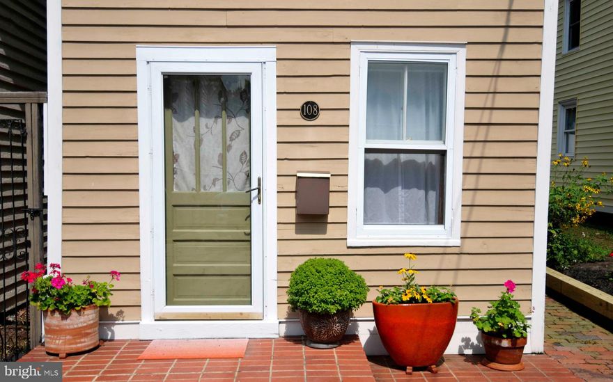 Price improvement! Cute as a button in the historic district on South Kent St. This 1-bedroom, 1.5 bath home is in the center of town, within walking distance to the farmers market and all the shops and restaurants. Just 4 blocks from Chestertown's waterfront promenade. Upstairs is a large, sun-filled room with a spacious closet that serves as an office.  It could also be a den or sitting room. Then enter the large bedroom and bathroom with a view of the garden below. The house has many possibilities for expansion.  The mature garden is a delight with trees and perennials throughout, surrounded with summer flowers.  Perfect for one or two people as a full-time residence or weekend getaway.