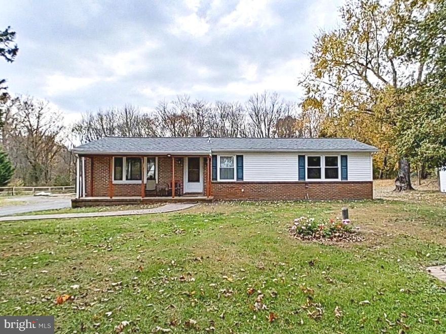 BRAND NEW ROOF AND WATER HEATER just installed and freshly painted front porch!!! Welcome to 4368 Norrisville Rd, a peaceful, private, and well maintained rancher on 1.48 acres. One level living with wooded scenery and 3 outbuildings all with electricity to enjoy hobbies such as gardening, working on cars, woodworking, or anything you like! The home features a primary suite with gorgeous updated full bath, 2nd bedroom with closet, and large full bath down the hall. The living area which has pellet stove to keep you cozy in the winter and help with utilities wraps around to the dining and kitchen . Spacious kitchen provides plenty of cabinet space and extra water filtration system under sink. Laundry room is found just off the kitchen for easy access, extra storage, and outdoor access. The detached garage is oversized, has attic for extra storage, connected electricity, wall mounted heating and cooling unit, and building could be easily connected to water source. Crawl space was completely redone and sealed and french drain installed 2015. Water heater and extra water filtration system 2017. Bring all offers!