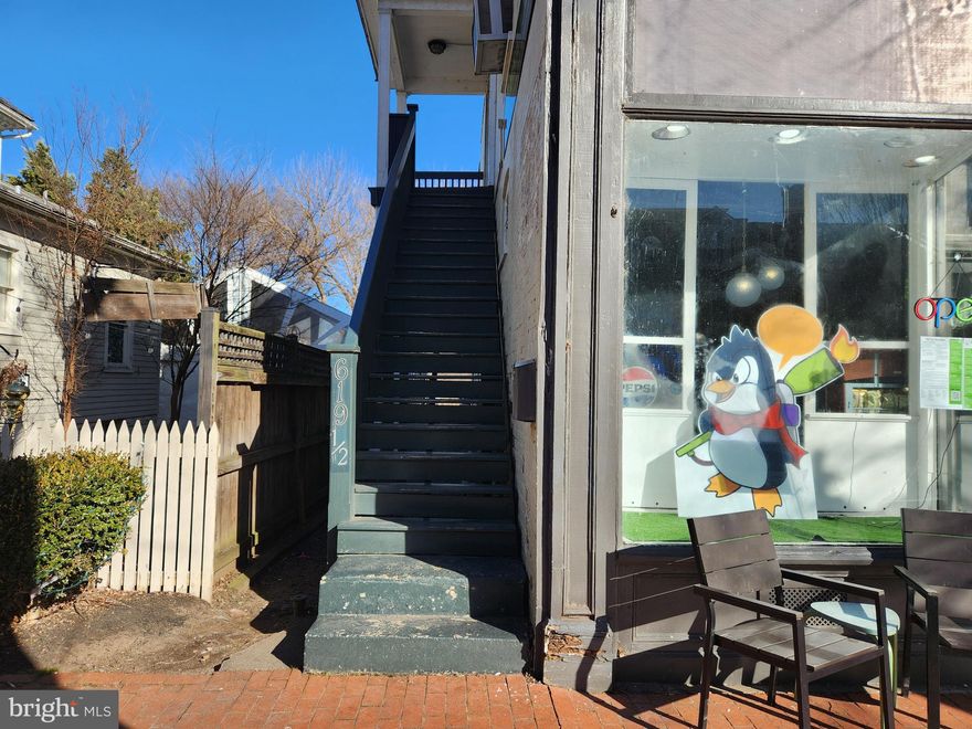 Welcome to 619.5 Caroline Street, a charming and character-filled residence located in the heart of historic downtown Fredericksburg. This apartment welcomes you with a large foyer entrance and showcases beautiful hardwood floors with rich character, ornate trim, and timeless architectural details throughout. Inside, you will find two generously sized bedrooms with large closets and a full bathroom featuring a classic clawfoot tub, with a new vanity currently being installed. The eat-in kitchen is well-appointed with granite countertops, a center island, pantry space, gas stove, dishwasher, and a refrigerator with ice maker—ideal for both everyday living and entertaining. Additional highlights include laundry in the unit, a back porch for outdoor enjoyment, and thoughtful updates that blend modern convenience with historic charm. One private parking space included. Perfectly situated just steps from local favorites such as Billikens, Always Flavored Gourmet Creations, and Original Grinds, this property offers an exceptional downtown lifestyle with dining, coffee, and culture right outside your door.