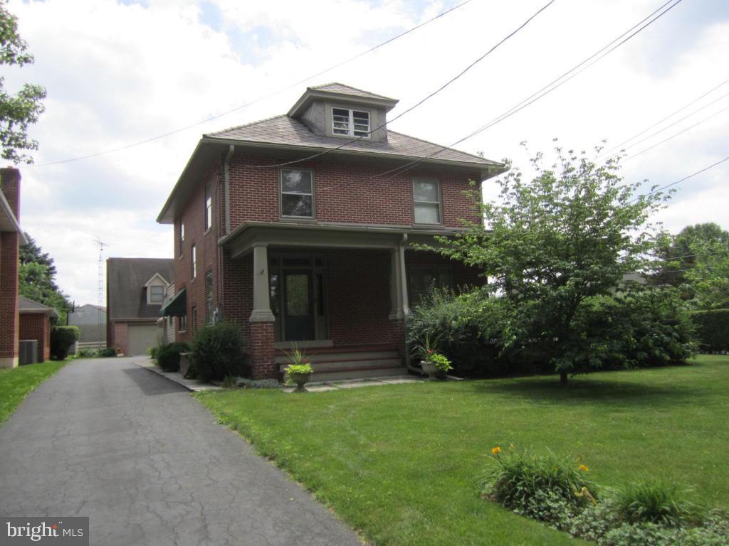 Charming 4-5 BR 2116 square foot brick 2 story w/separate 800 square foot 2 BR 1 bath in law apartment above the heated 50x30 garage w/3 overhead doors. Lovely interior woodwork including a butlers pantry & china Cabinets. Large wraparound porch overlooking the manicured & private corner lot complete with herb gardens & mature landscaping. Conveniently located just a few minutes walk to schools, sports fields, Lititz Springs Park & downtown!!!