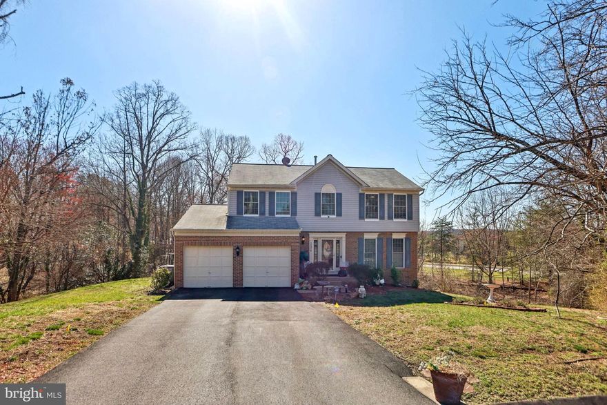 Welcome to this spacious 4-bedroom, 3.5-bath single-family home, located on a peaceful cul-de-sac and offered As-Is, presenting a great opportunity for customization. The home features beautiful hardwood flooring on the main and upper levels, two welcoming family rooms, including one with an unused gas fireplace. The open-concept kitchen with an island flows into formal living and dining areas, and there’s a convenient half bath. Upstairs, the primary suite includes an en-suite bath and a generous walk-in closet, while three additional bedrooms share a full hall bathroom.

The fully finished basement, with its own separate entrance, provides additional living space with a large recreation area, a den or bonus room (ideal for an office or guest room), a wet bar, and an extra refrigerator—perfect for entertaining. Outside, enjoy the private deck with jacuzzi access. Additional highlights include an automatic sprinkler system, a charming sunroom opening to a second deck, a two-car garage, and a driveway with space for six cars.

While the home could use some TLC, including cosmetic updates and minor repairs, it offers incredible potential in a desirable location, near major routes, shopping, and dining. Don’t miss this opportunity—schedule your private tour today!