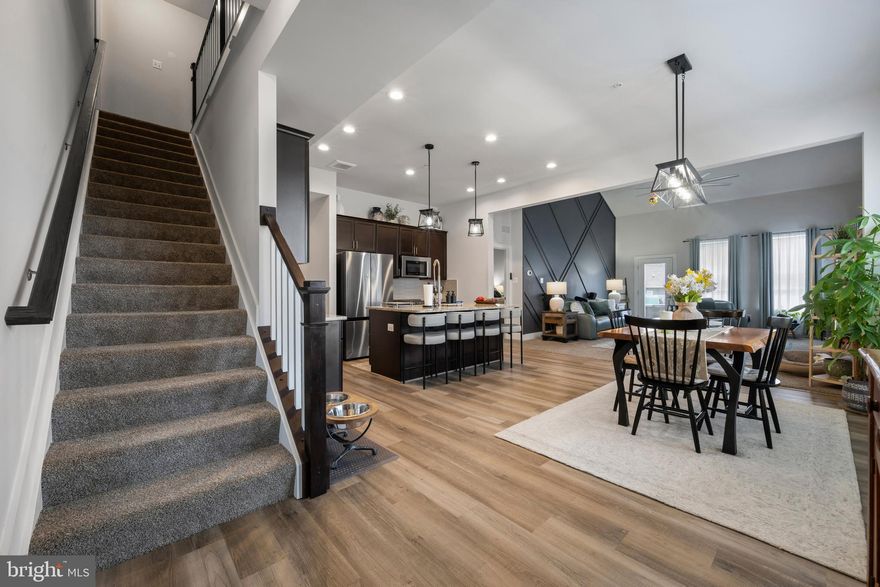 Welcome home to this stunning end unit craftsman townhome in the newer community of Sanders Summit in New Windsor. This townhome offers additional bedrooms and a finished basement, unlike many of the towns in Sanders Summit. This gorgeous, turnkey home features 5 bedrooms,  2.5 baths, a contemporary custom accent wall in the main living room, plenty of entertaining space, a fabulous modern kitchen, large deck, and a lovely open concept main floor. Vaulted ceilings make this already spacious home feel even more grand. Move right in with nothing to worry about! Book your showing today, and start enjoying all that this amazing townhome has to offer! Modern, sleek, and luxurious perfection all wrapped into one home! You could not ask for more! Conveniently located near shopping, dining, entertainment and major MD routes 27, 31, 97 and 140. Won't be on market long!