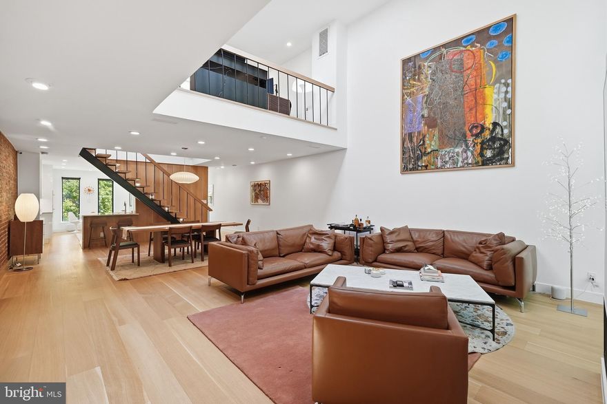 A rare, fully reimagined compound in the heart of Dupont Circle offering nearly 5,200 square feet across a three-level main residence, English basement suite, and a separate three-story double-width carriage house. This configuration is exceptionally uncommon, combining scale, design, and income potential in one offering.

The main residence features three finished levels with custom rift-sawn white oak flooring, natural slab Quartzite in all kitchens, large scale tile in all bathrooms on floors and walls, Italian lacquer cabinetry, and integrated European appliances. Natural light fills the space through new architectural windows and skylights, complementing a total renovation completed in 2026 with new HVAC, roof, and building systems throughout.

The terrace level provides a well-designed and light filled income-producing or guest suite with a private entrance.

Beyond a generous private courtyard, the carriage house offers three garage spaces at grade and two fully renovated one-bedroom residences above, each finished with wide plank French white oak floors, high-end kitchens, and designer baths. This structure alone is a rarity within Dupont Circle.

In total, the property offers four independent living spaces, creating flexibility as a primary residence with rental income, a multi-unit investment, or a private in-town compound.

Additional features include four gas fireplaces, heated bathroom floors in the main residence, motorized shades throughout, integrated security system with cameras, programmable locks, and a fully networked infrastructure. Outdoor living is equally considered with a private roof deck, lounge area, outdoor gas firepit, grill, and hot tub.

Parking for up to eight vehicles, including a heated three-car garage, further distinguishes the offering.

Located just moments from Dupont Circle, Metro, and some of Washington’s best dining and retail, this is a turnkey, high-performing asset with exceptional design, execution, and versatility.