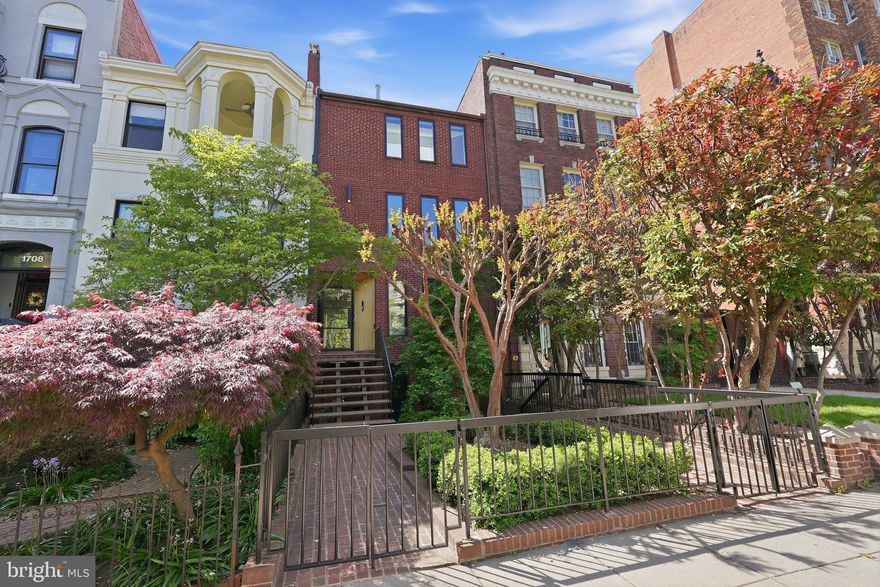 A rare, fully reimagined compound in the heart of Dupont Circle offering nearly 5,200 square feet across a three-level main residence, English basement suite, and a separate three-story double width carriage house. This configuration is exceptionally uncommon, combining scale, design, and income potential in one offering.

The main residence features three finished levels with custom rift-sawn white oak flooring, natural slab Quartzite in all kitchens, large scale tile in all bathrooms on floors and walls, Italian lacquer cabinetry, and integrated European appliances. Natural light fills the space through new architectural windows and skylights, complementing a total renovation completed in 2026 with new HVAC, roof, and building systems throughout.

The terrace level provides a well-designed and light filled income-producing or guest suite with a private entrance.

Beyond a generous private courtyard, the carriage house offers three garage spaces at grade and two fully renovated one-bedroom residences above, each finished with wide plank French white oak floors, high-end kitchens, and designer baths. This structure alone is a rarity within Dupont Circle.

In total, the property offers four independent living spaces, creating flexibility as a primary residence with rental income, a multi-unit investment, or a private in-town compound.

Additional features include four gas fireplaces, heated bathroom floors in the main residence, motorized shades throughout, integrated security system with cameras, programmable locks, and a fully networked infrastructure. Outdoor living is equally considered with a private roof deck, lounge area, outdoor gas firepit, grill, and hot tub.

Parking for up to eight vehicles, including a heated three-car garage, further distinguishes the offering.

Located just moments from Dupont Circle, Metro, and some of Washington’s best dining and retail, this is a turnkey, high-performing asset with exceptional design, execution, and versatility.